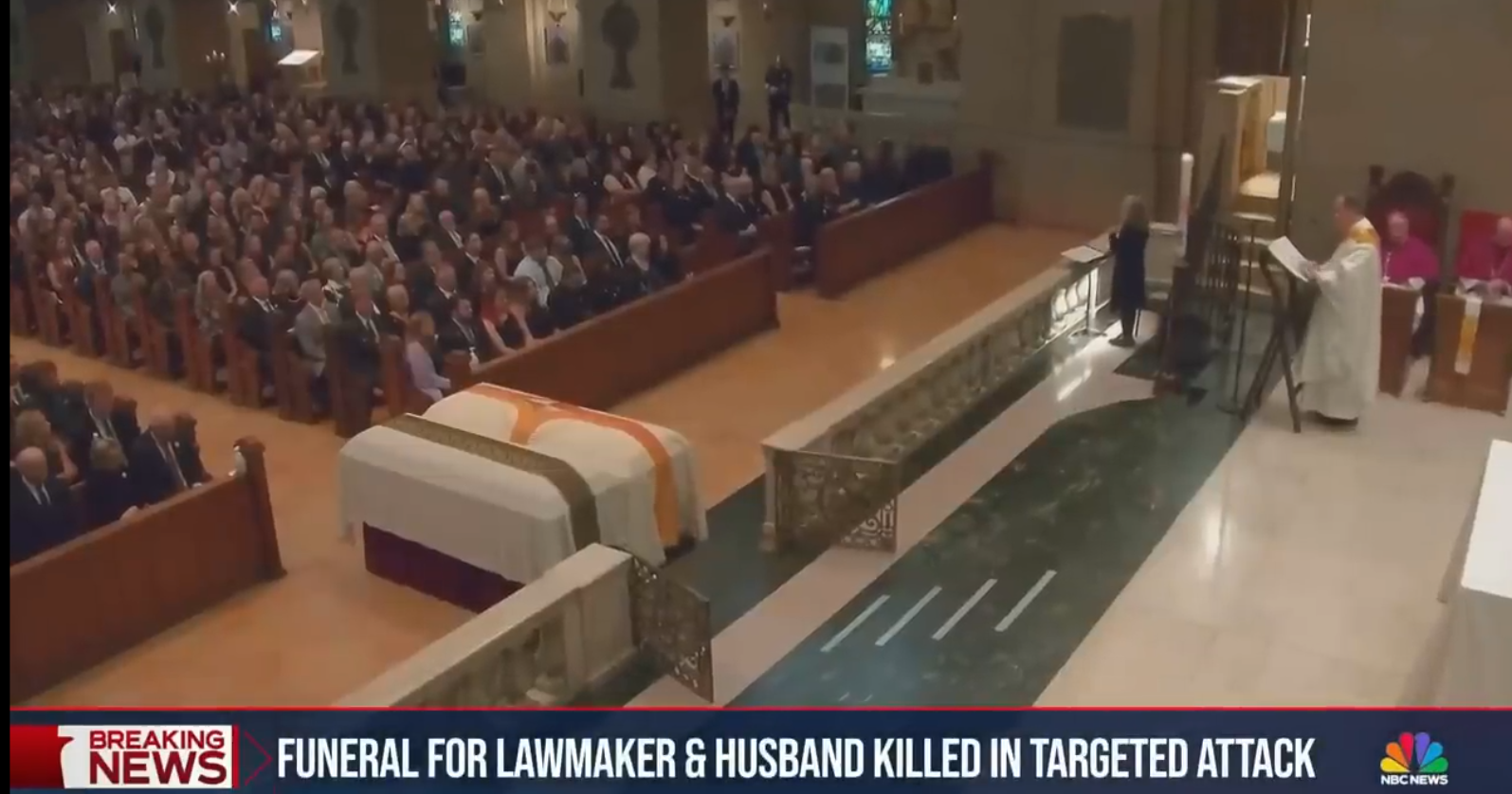 The couple's caskets placed before the altar during the funeral Mass | Source: YouTube/nbcnews
