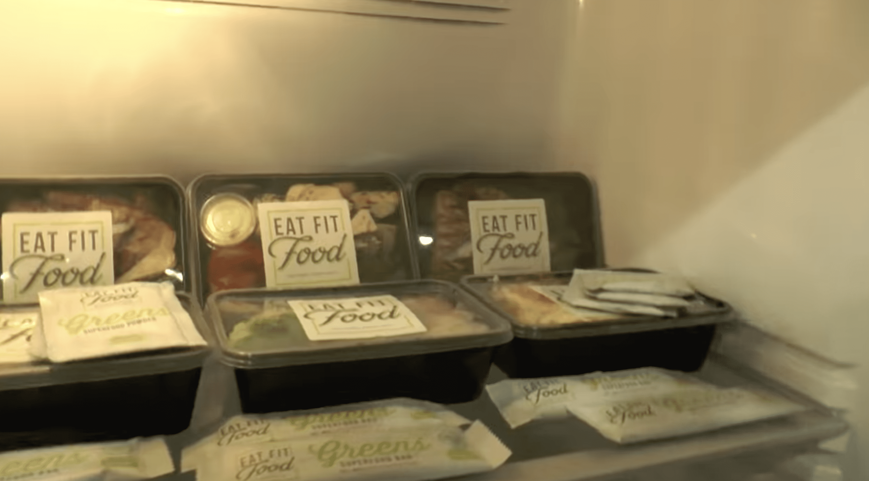 A closer view of Amanda's fridge stacked with months of food delivery supplies. | Photo: Photo: YouTube.com/Kyle and Jackie O