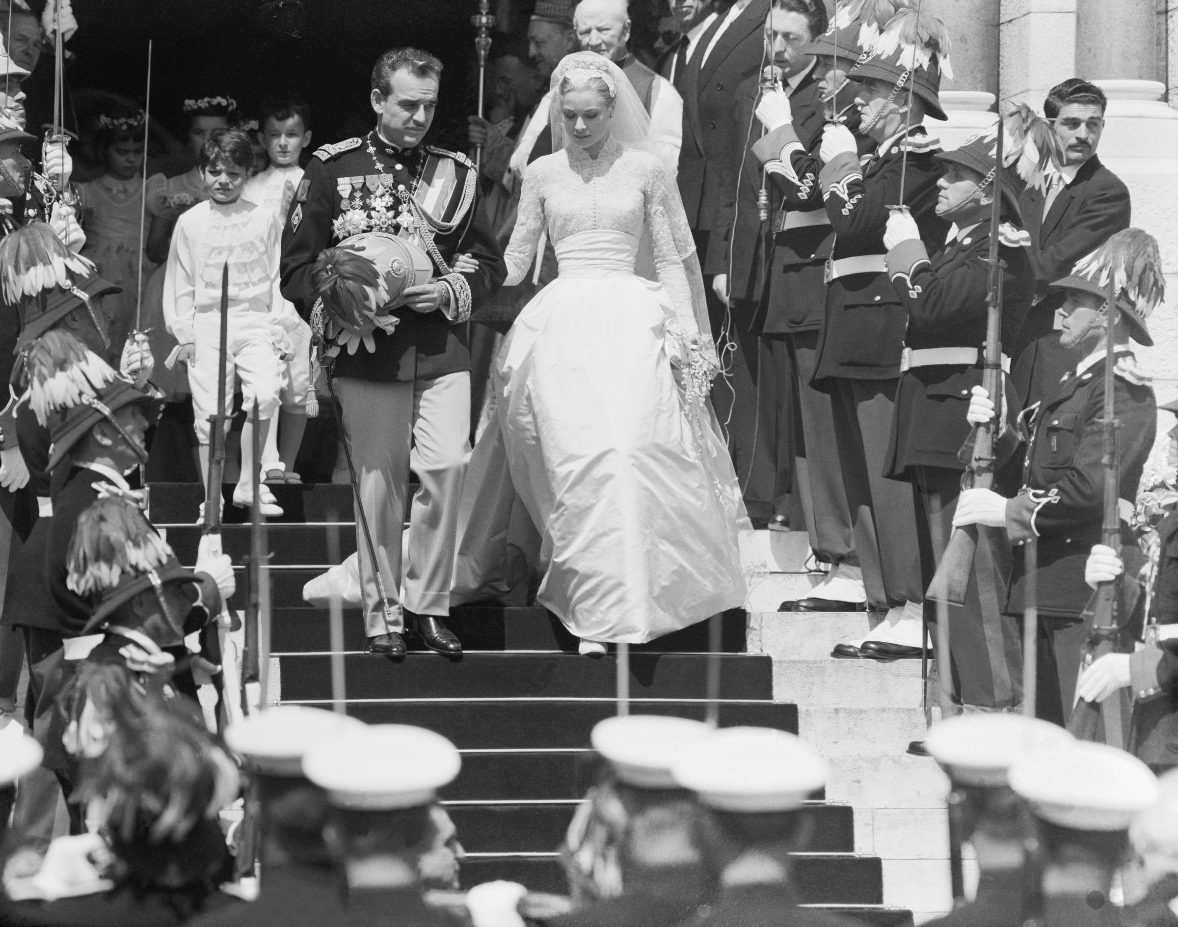 Prince Rainier and Grace Kelly leave Monaco Cathedral following their Roman Catholic ceremony on April 19, 1956, in Monaco. | Source: Getty Images