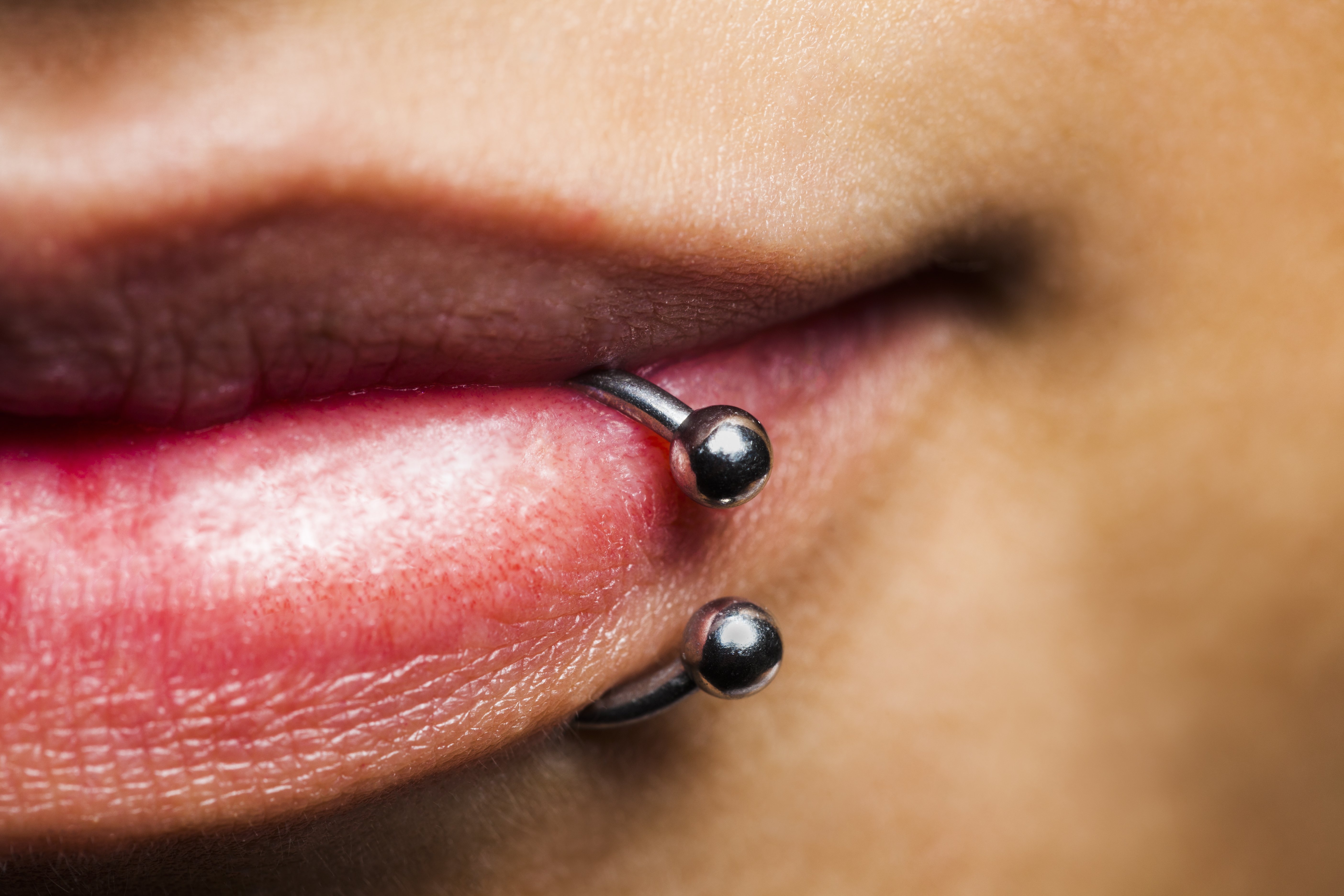 Woman with snake bite piercing | Source: Getty Images