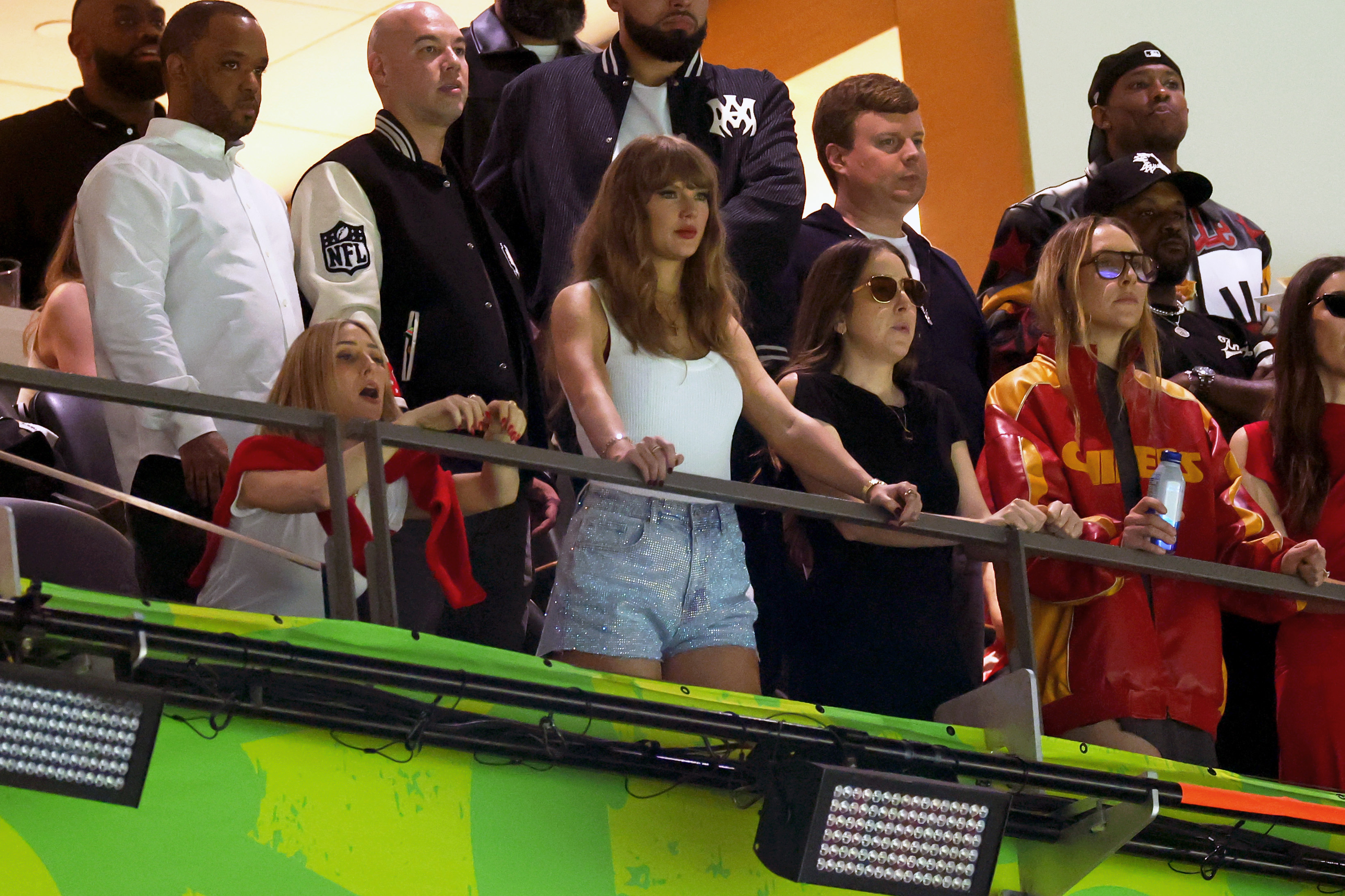 Ashley Avignone and Taylor Swift with Alana and Este Haim at Super Bowl LIX on February 9, 2025, in New Orleans, Louisiana | Source: Getty Images