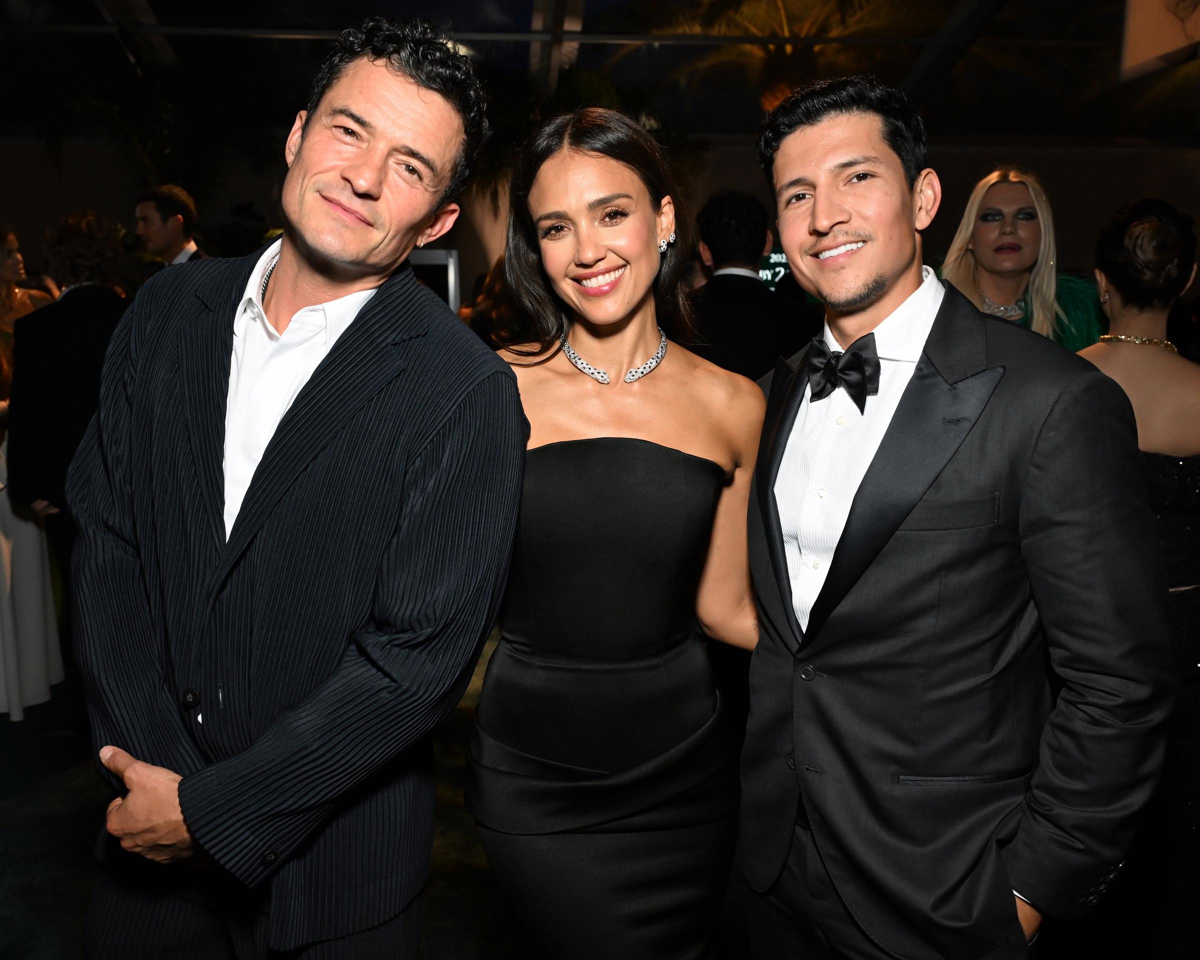 Orlando Bloom smiles beside Alba and Ramirez as they attend the 2025 Baby2Baby Gala Presented By Paul Mitchell at Pacific Design Center on November 08, 2025 in West Hollywood, California.