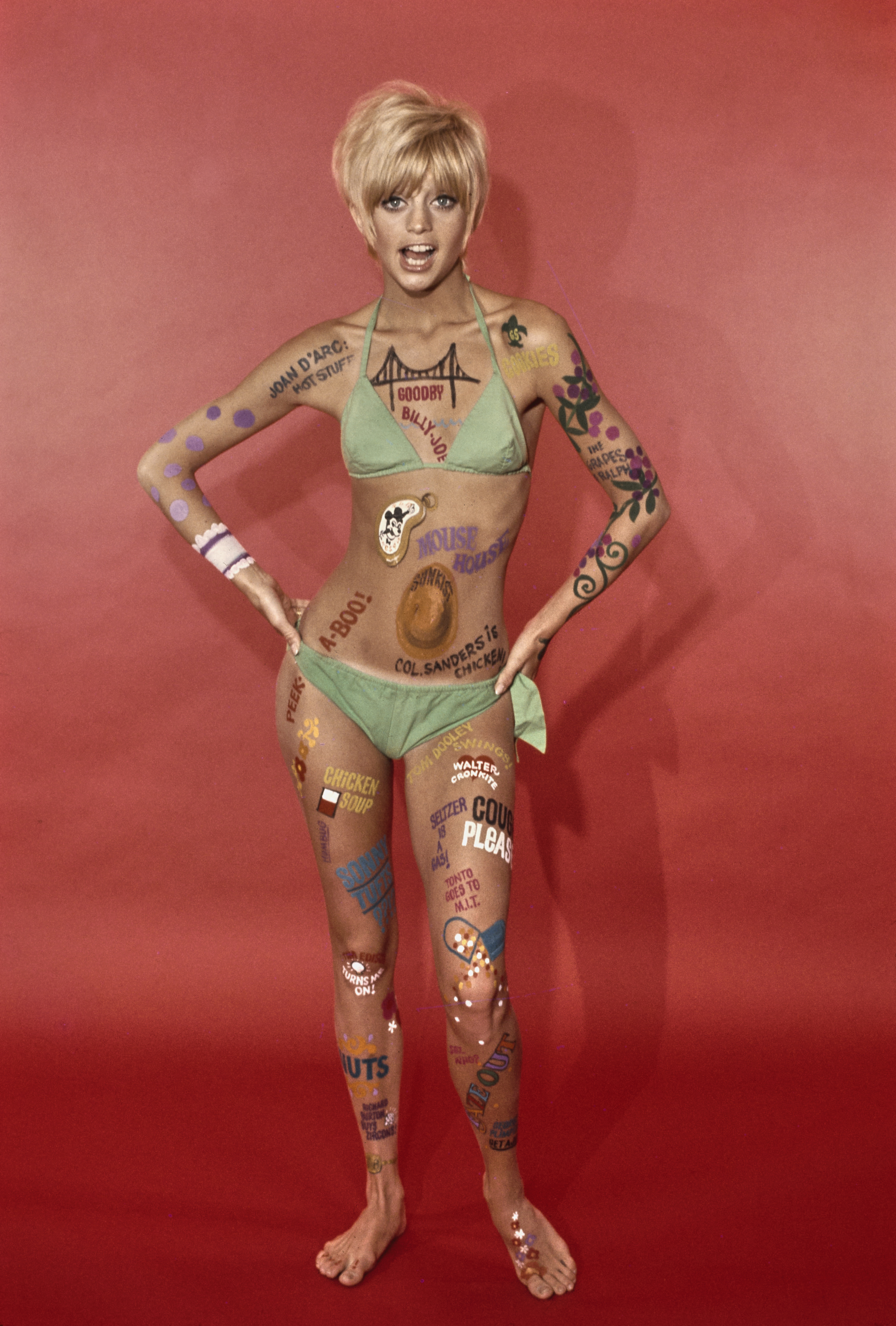 Goldie Hawn wears body paint and a bikini in a promotional portrait for the television series, 'Laugh-In', on June 30, 1968. | Source: Getty Images