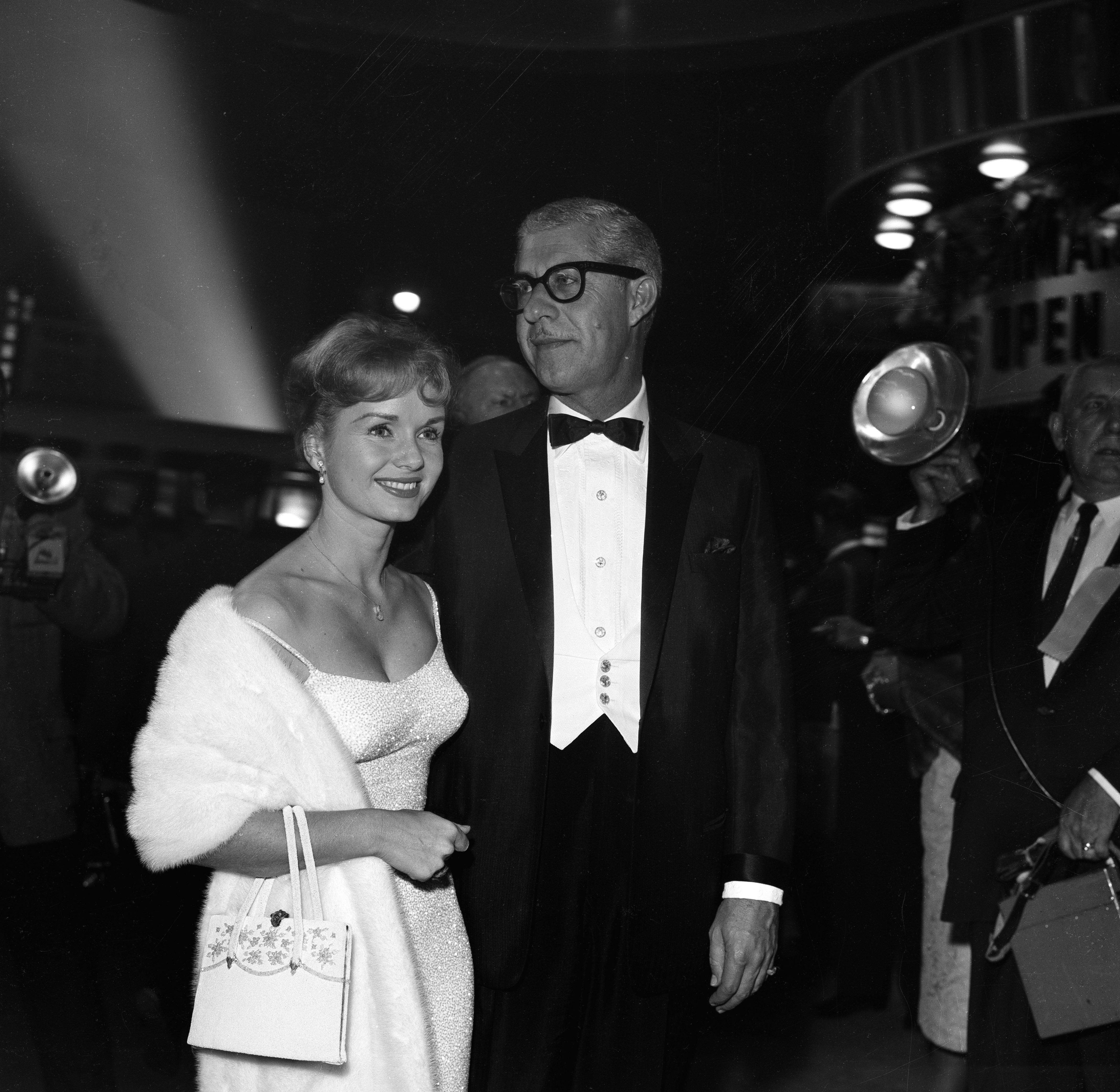 Debbie Reynolds and Harry Karl attend an event on January 1, 1959 in Los Angeles, California ┃Source: Getty Images