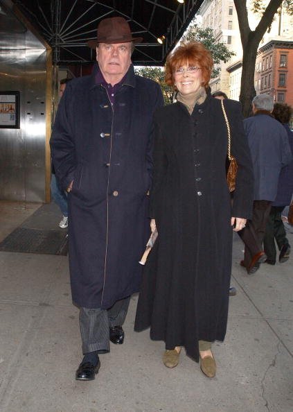Robert Wagner walking along Madison Avenue with Jill St. John on November 6, 2004, in New York City. | Source: Getty Images.