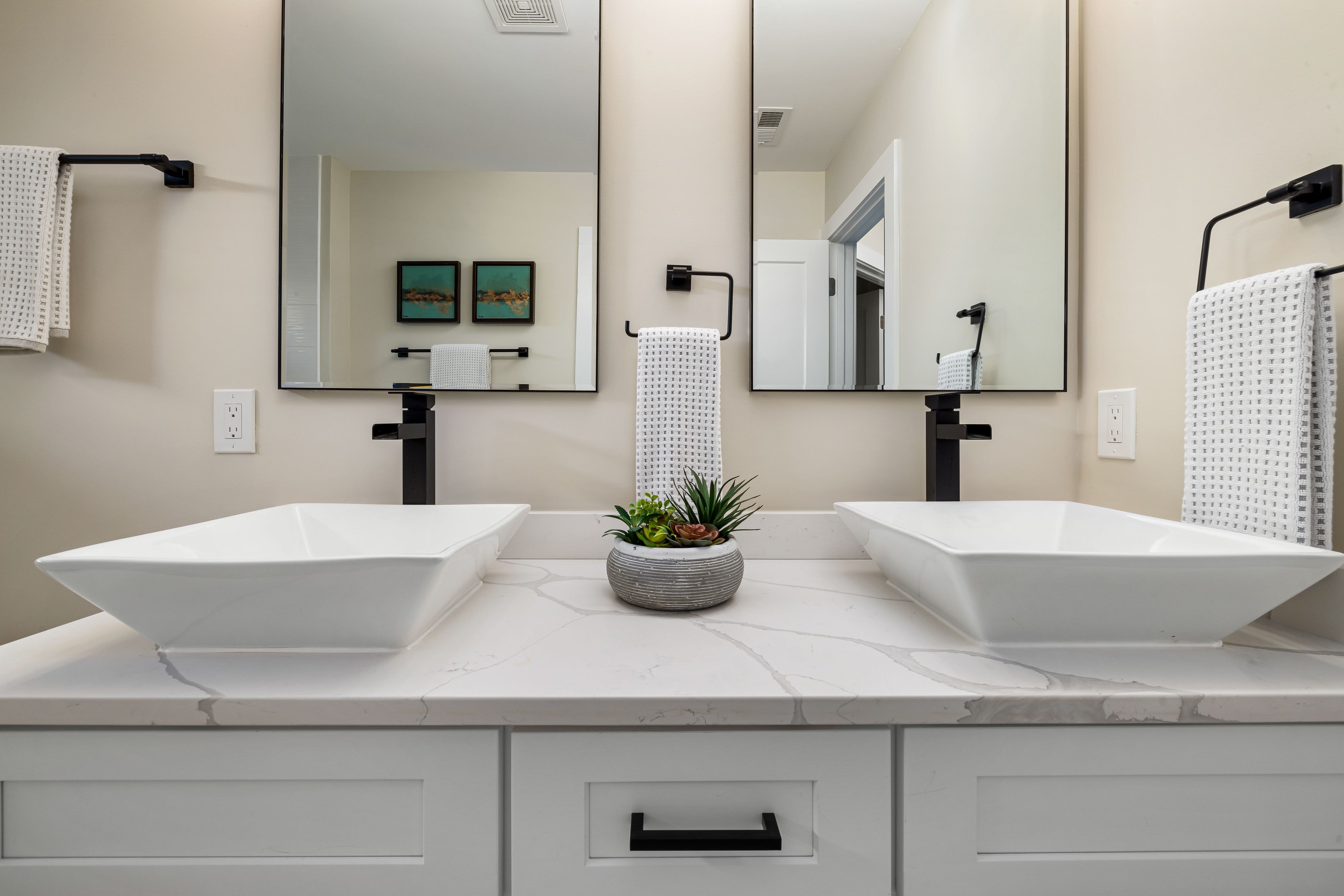Powder room with two vessel sinks | Source: Pexels