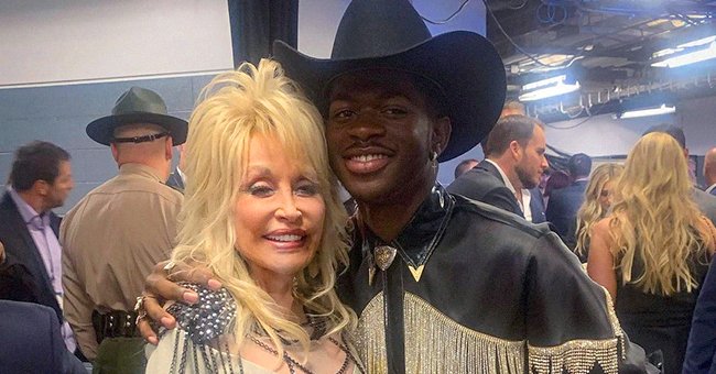 Dolly Parton and Lil Nas X pose together for a picture posted on Dolly Parton's Instagram page | Photo: Instagram @dollyparton