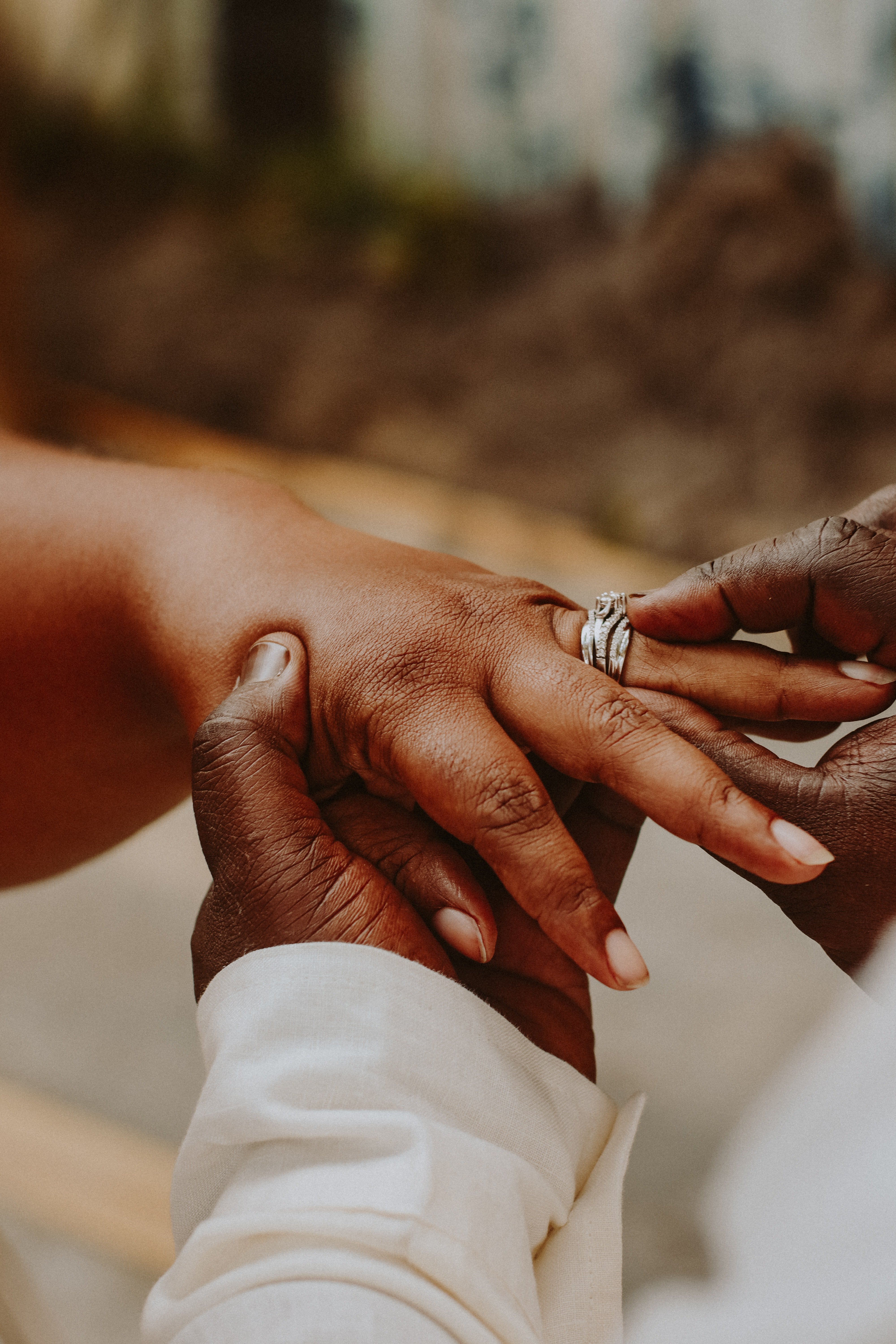 An image of an close shot of a couple getting married | Source: Unsplash