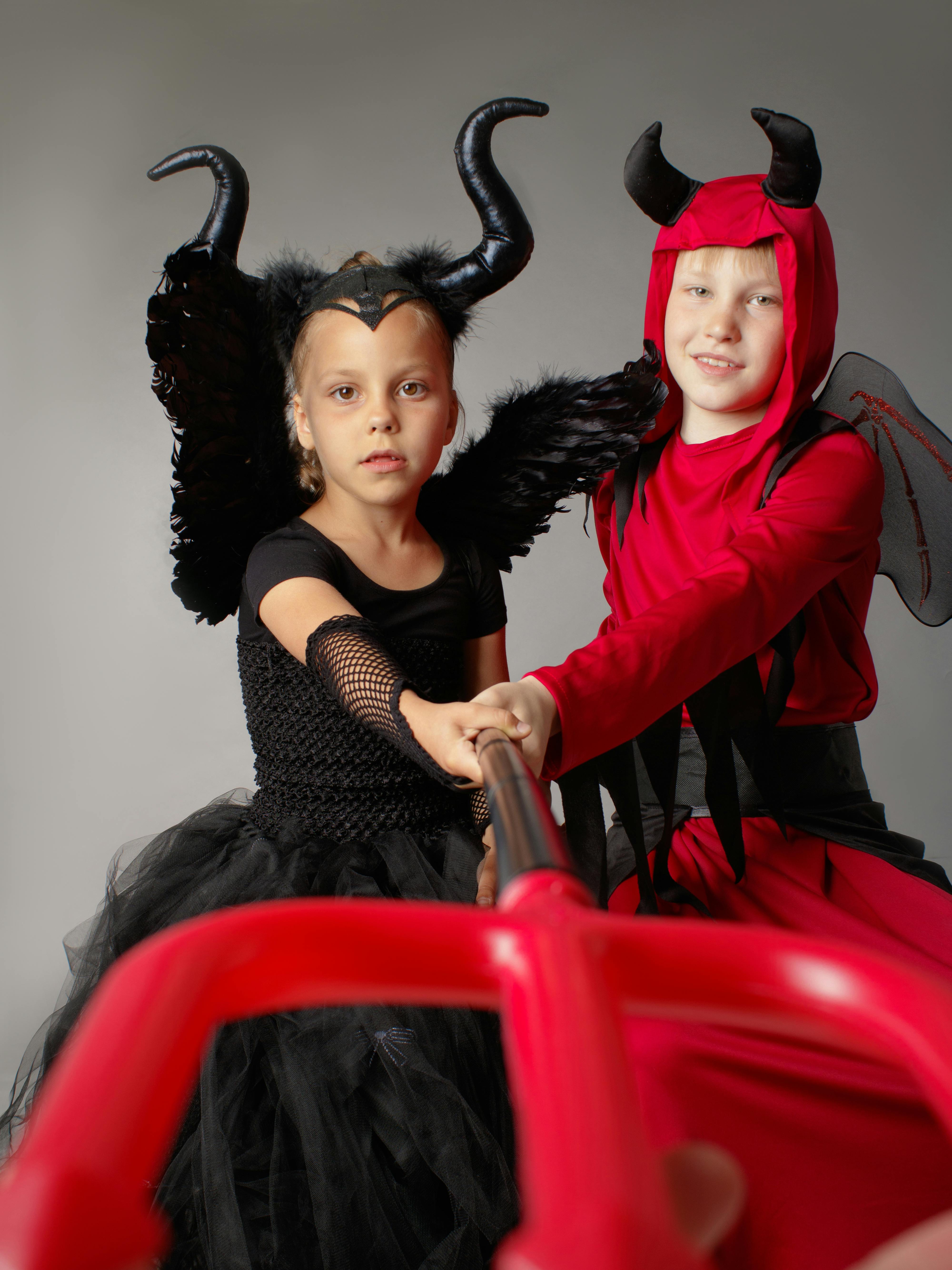 Two children in their Halloween costumes | Source: Pexels