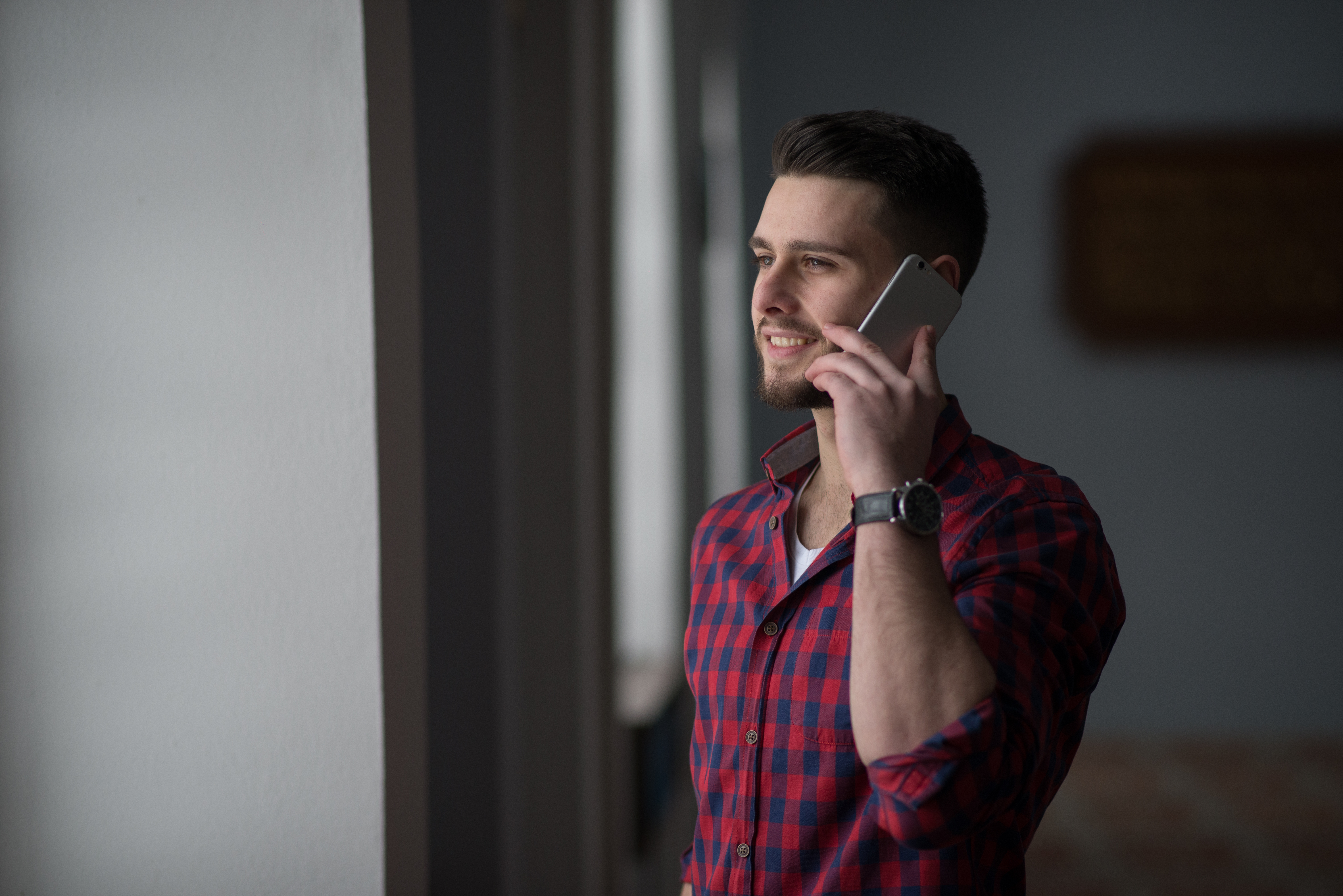 A man talking on the phone | Source: Shutterstock