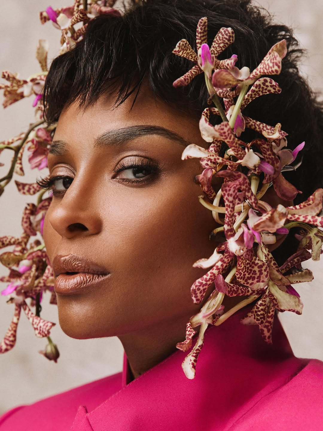 The Grammy winner pairs orchids with a bold beauty look | Source: Instagram/ciara/