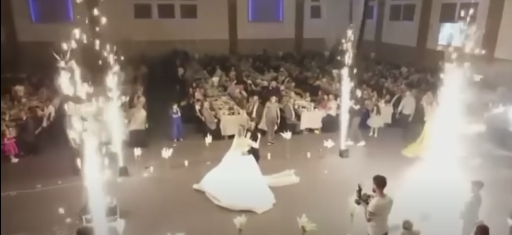 Flares going off as Haneen and Revan Isho danced at their wedding | Source: youtube.com/@SkyNews