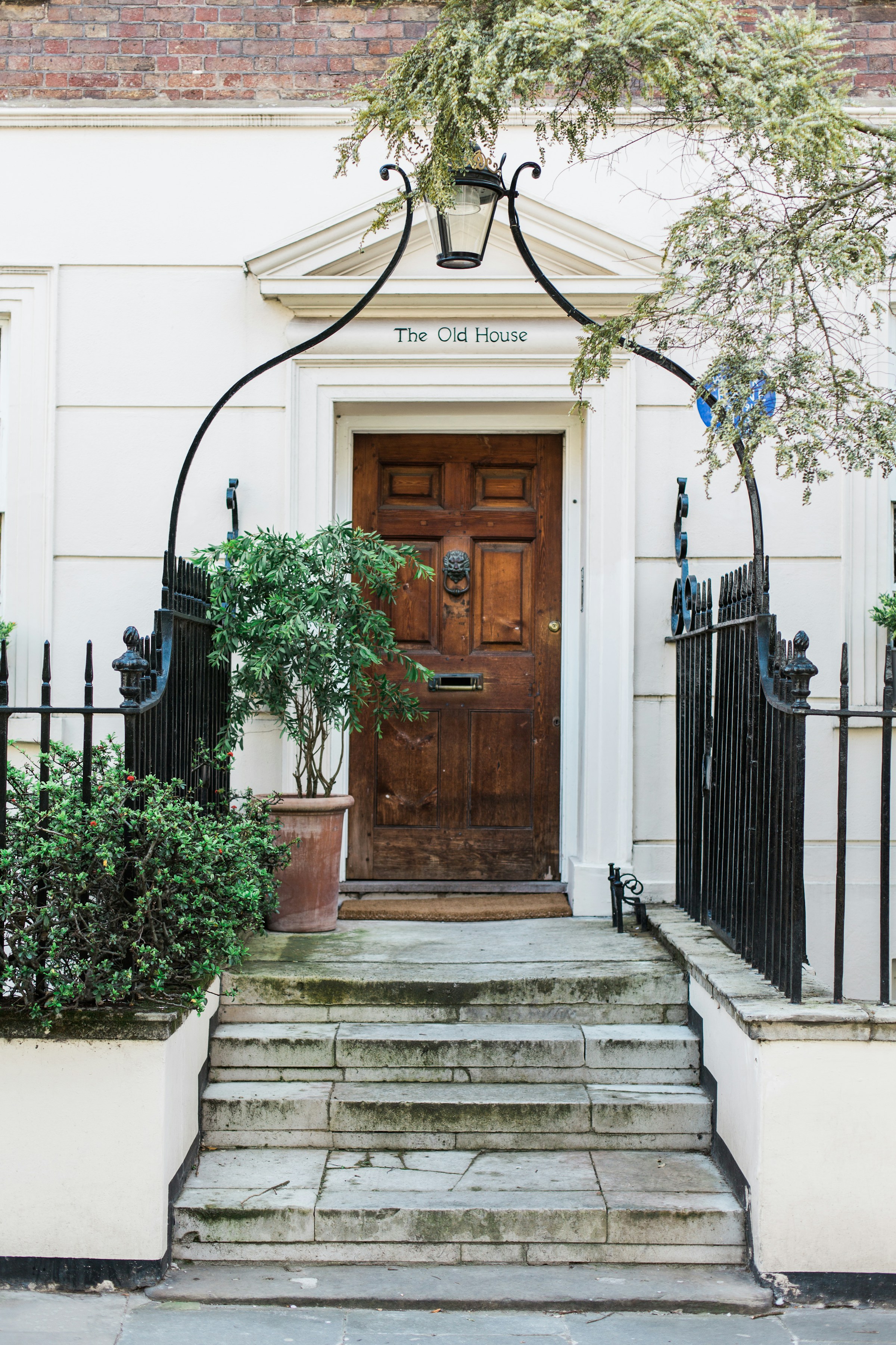 Facade of a house with the door slammed shut | Source: Unsplash