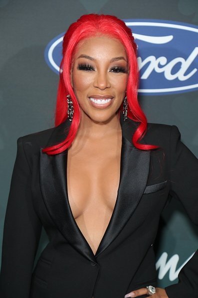 K. Michelle posing backstage at the 2019 Soul Train Awards presented by BET in Las Vegas, Nevada.| Photo: Getty Images.