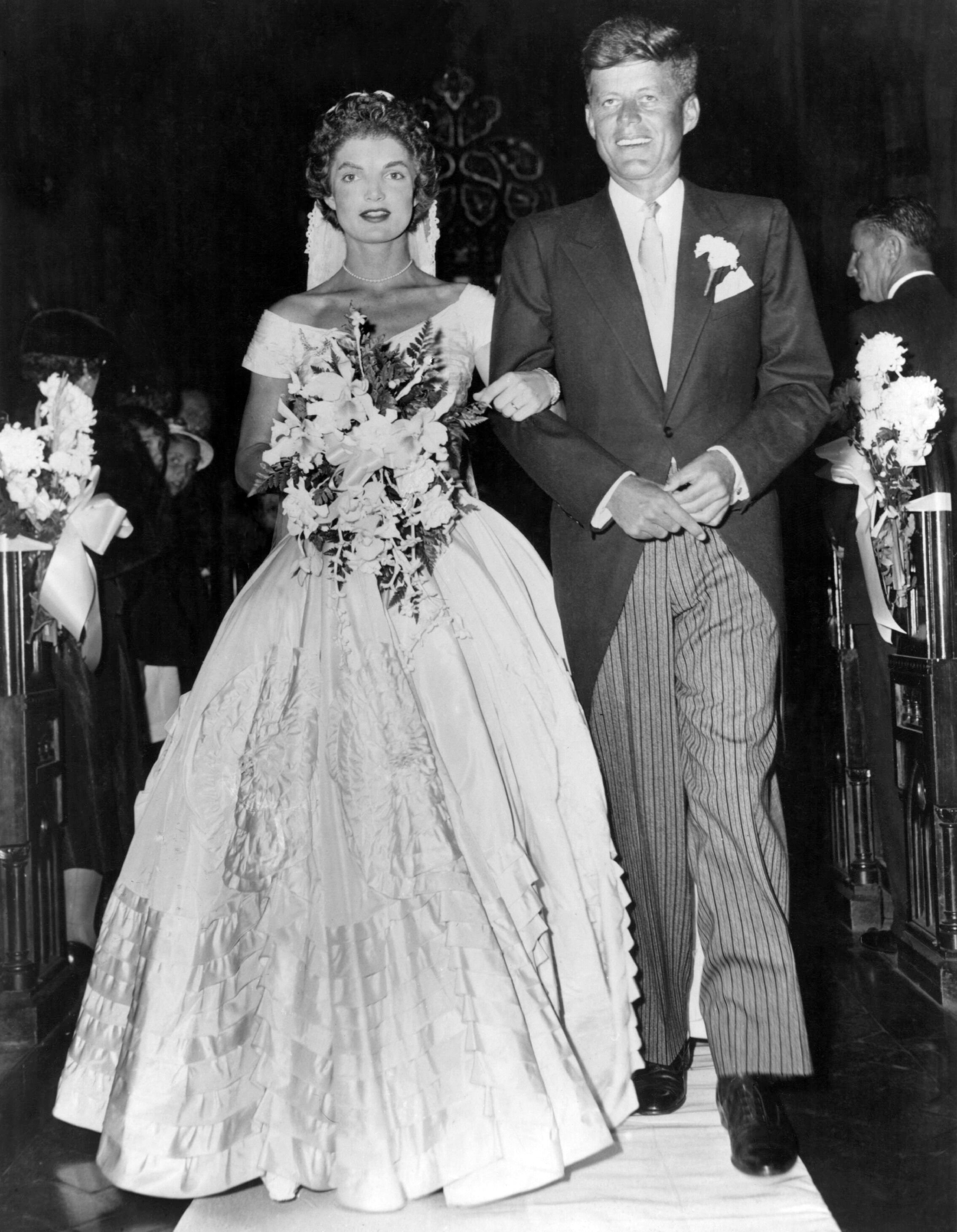 John Fitzgerald Kennedy and Jackie Kennedy after their wedding ceremony at Newport, Rhode Island. | Source: Getty Images