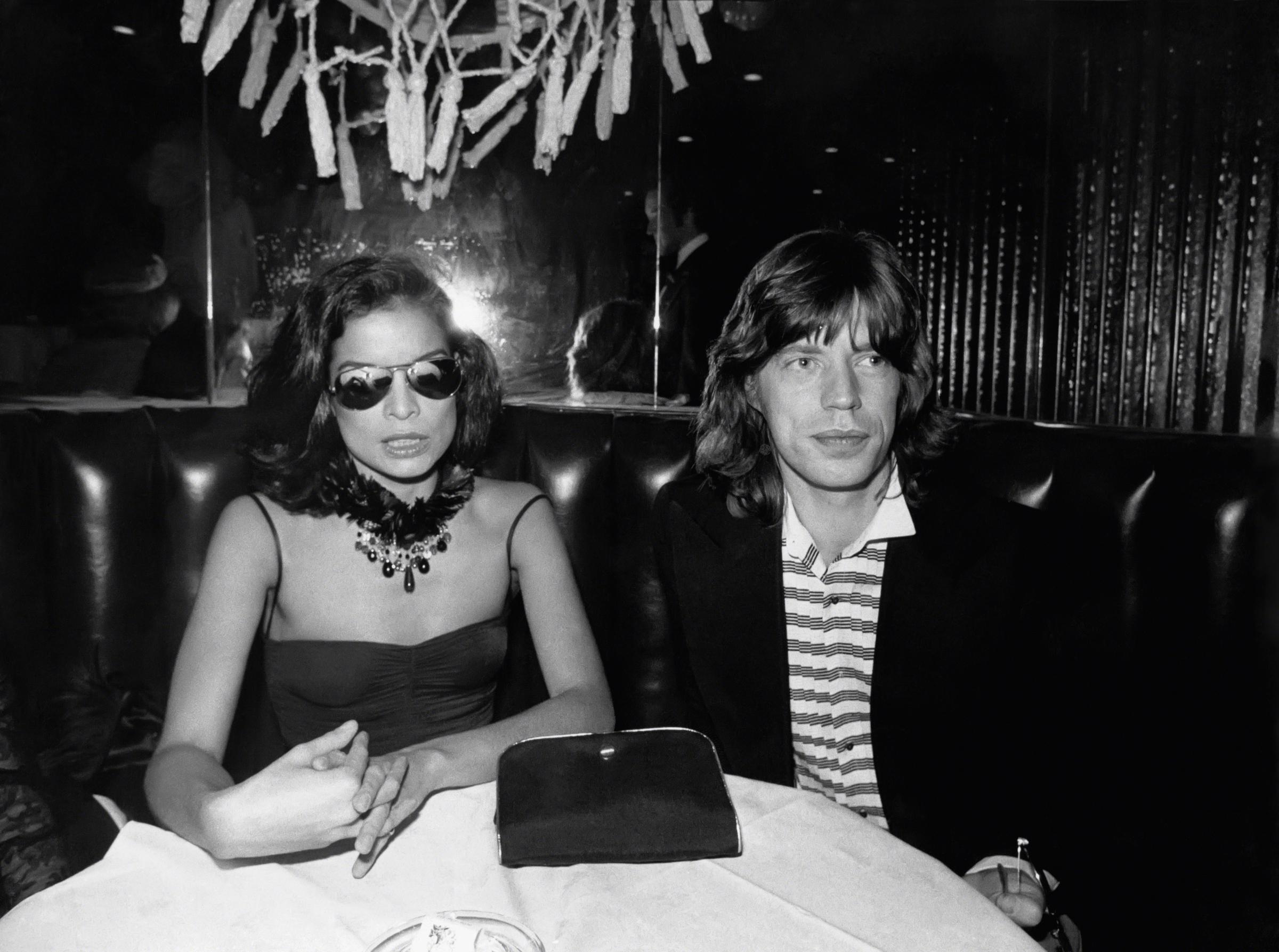 Bianca Jagger and Mick Jagger at Copacabana's on January 1, 1976, in New York City. | Source: Getty Images