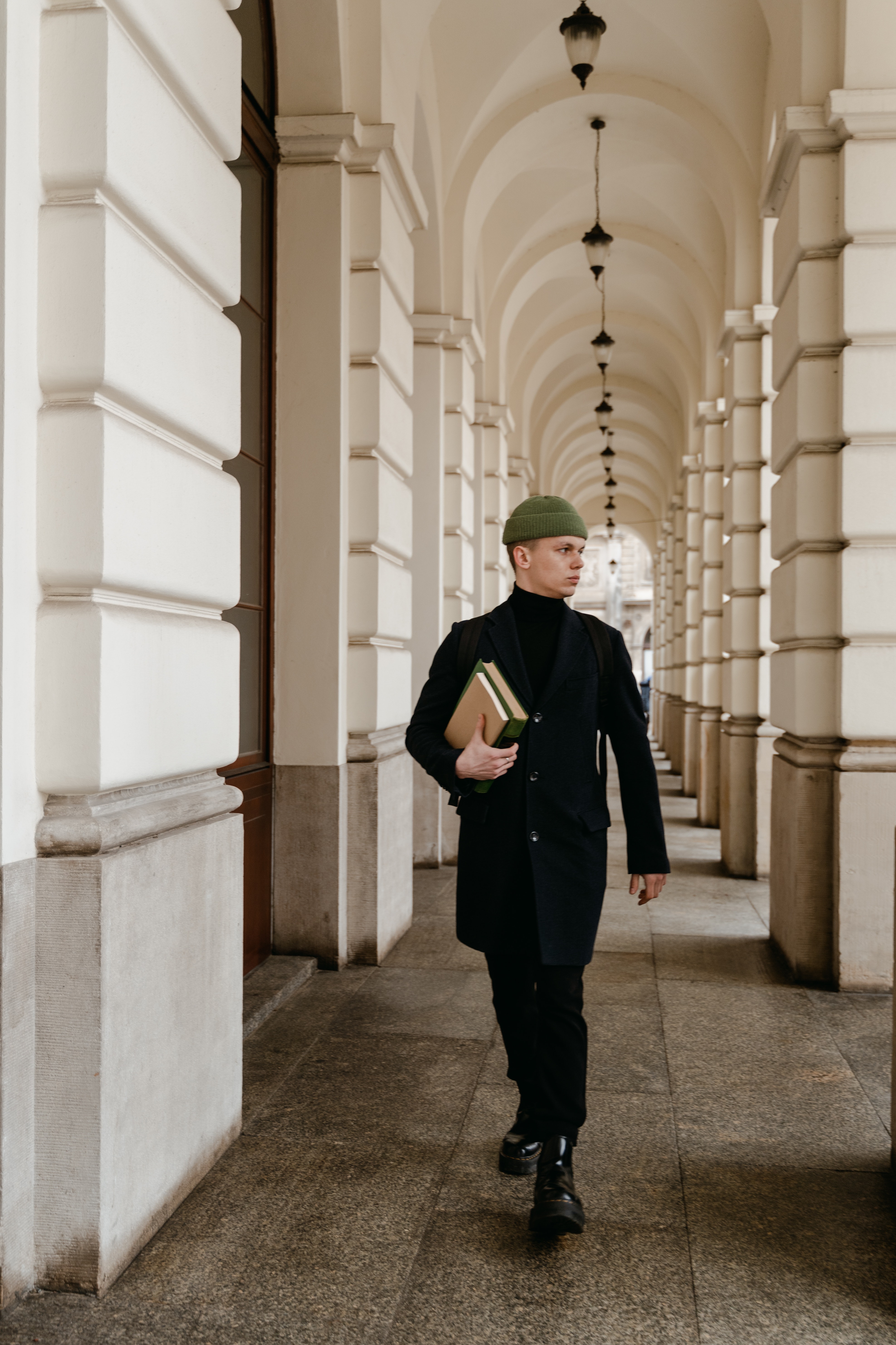 Man holding books | Source: Pexels