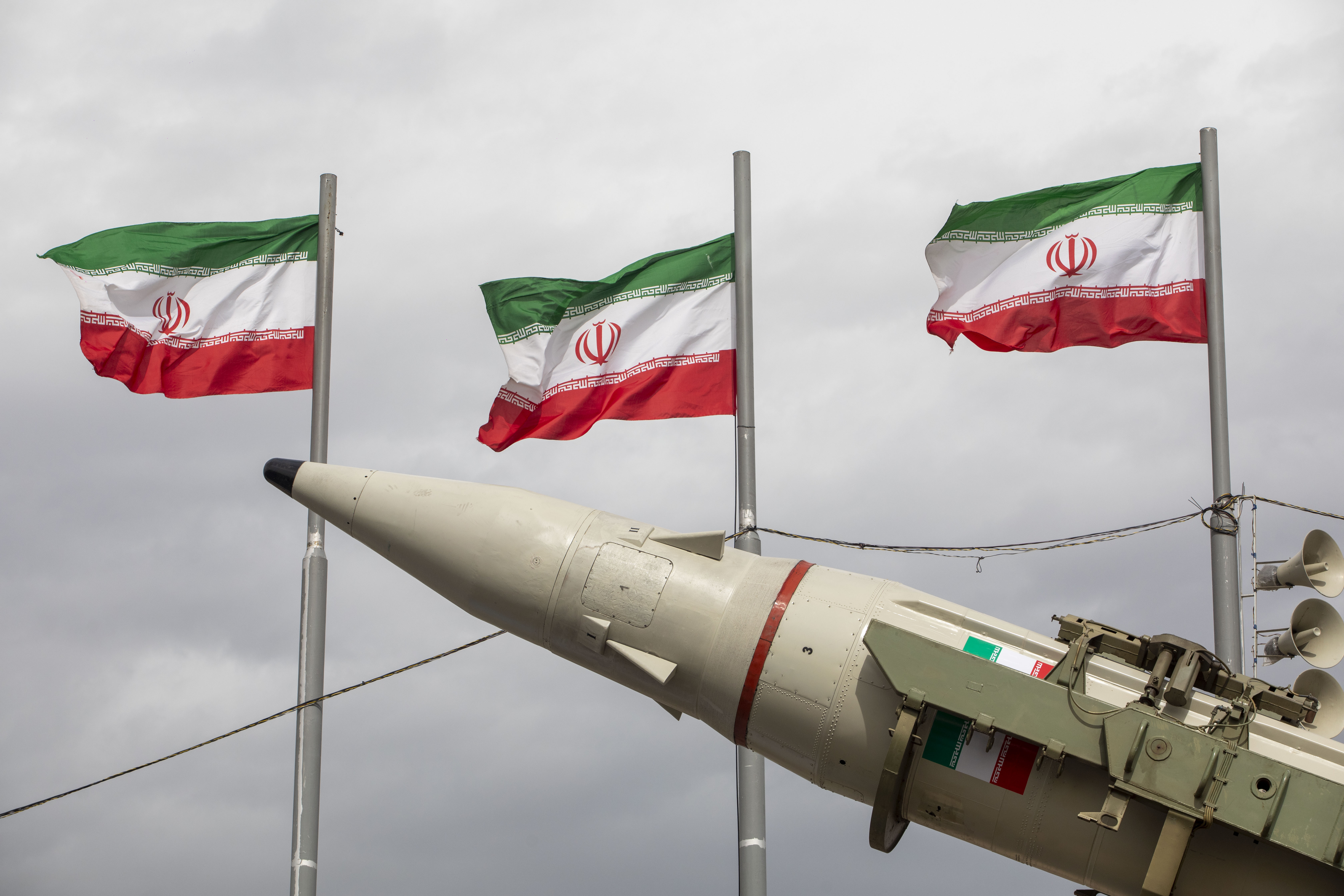 Missiles produced by Iran's armed forces are displayed near a row of Iranian flags during commemorations to mark the anniversary of the 1979 Iranian Revolution on February 11, 2026 in Tehran, Iran. | Source: Getty Images