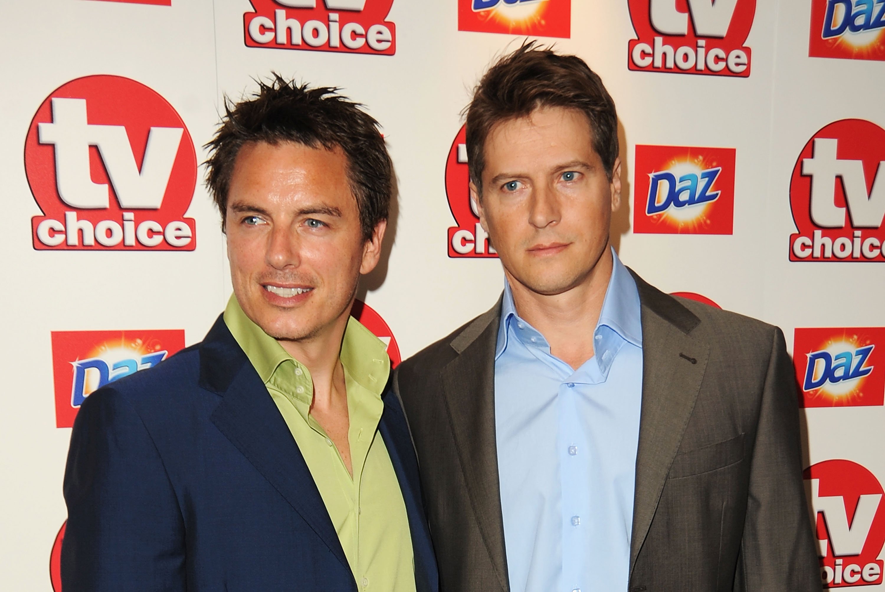 John Barrowman (L) and Scott Gill arrive at the TVChoice Awards 2010 held at The Dorchester, on September 6, 2010 in London, England. | Source Getty Images