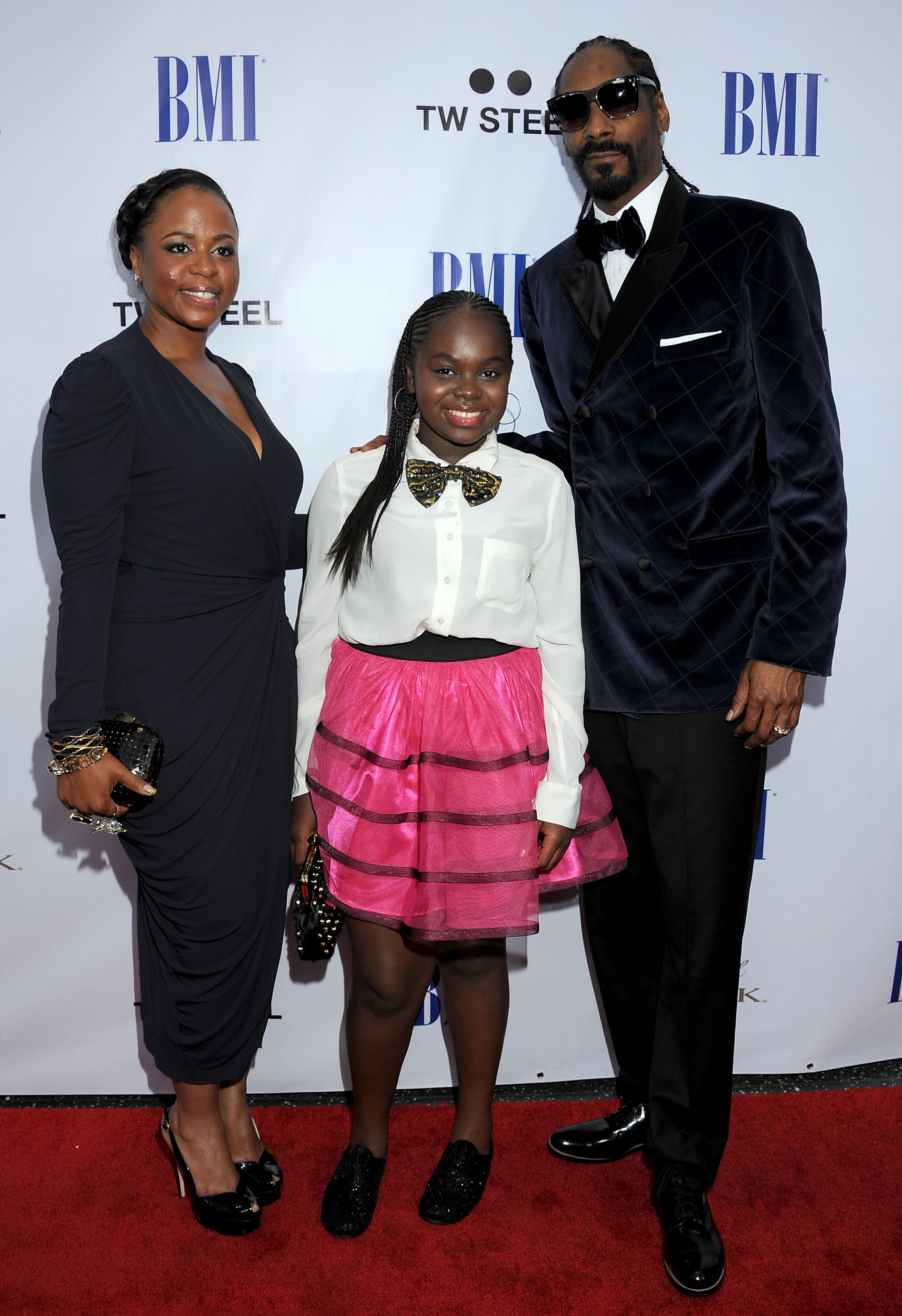 Shante Broadus, Cori Broadus and Snoop Dogg arrive at the 11th Annual BMI Urban Awards on August 26, 2011, in Los Angeles, California. | Source: Getty Images