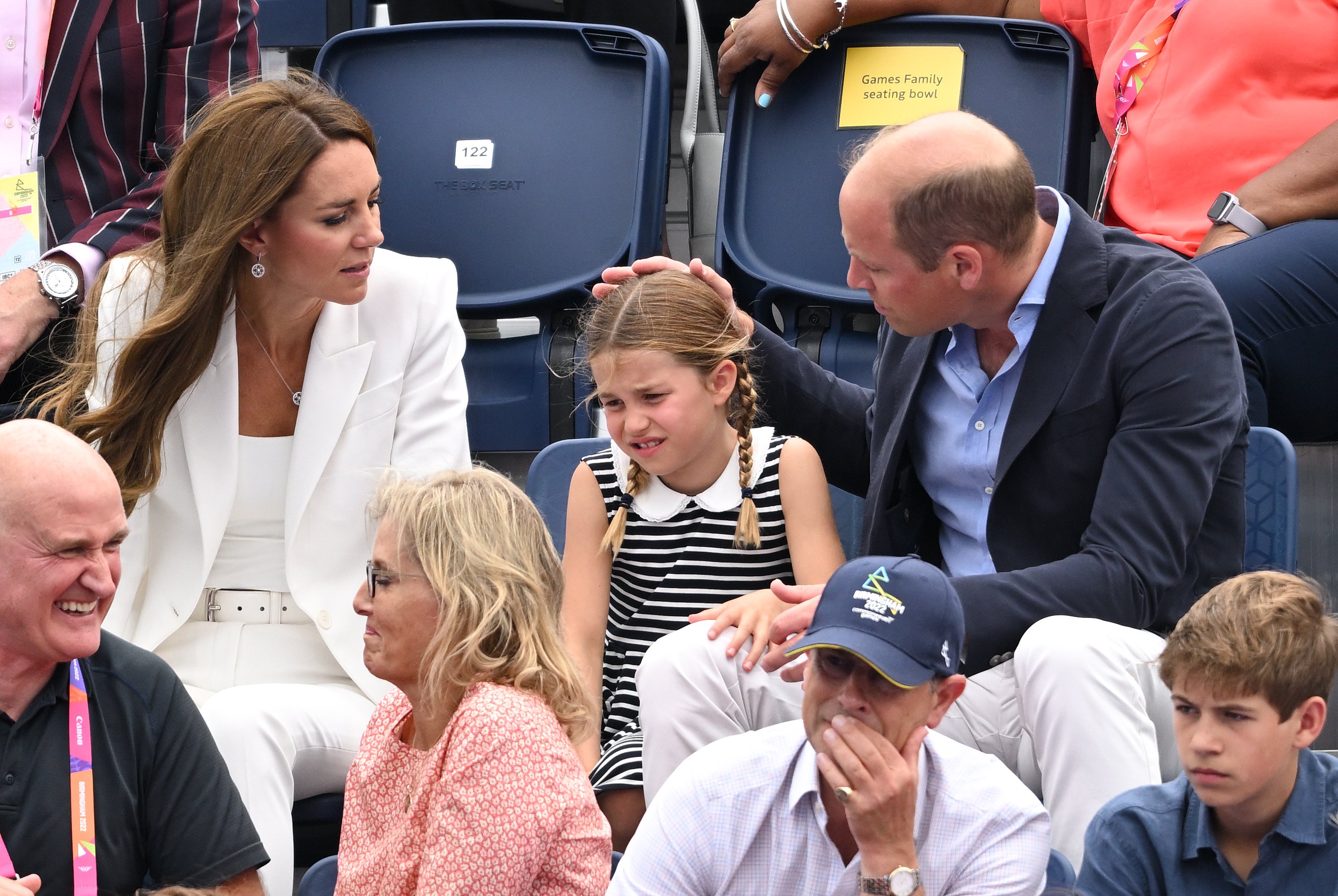 Duchess Kate, Princess Charlotte, and Prince William at the hockey game during the Commonwealth Games on August 2, 2022, in Birmingham, England | Source: Getty Images