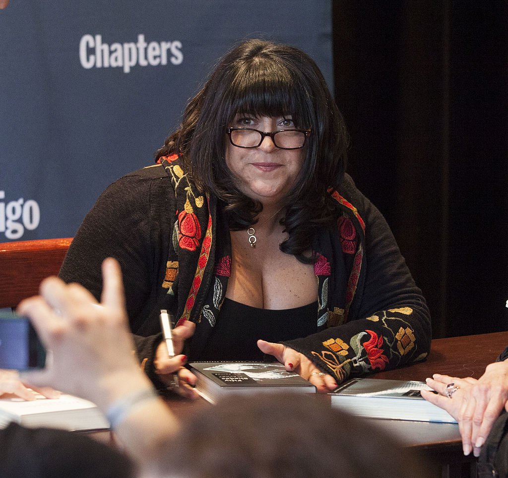 "Fifty Shades of Grey", l'auteure E.L. James rencontre ses fans lors de sa séance de dédicace chez Chapters, le 16 février 2014 à Vancouver, au Canada. | Photo : Getty Images