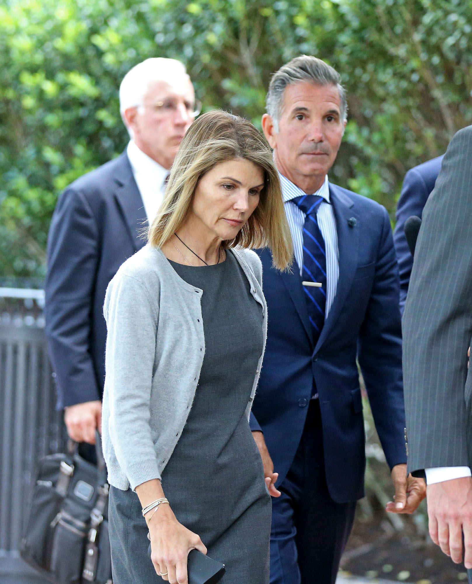  Lori Loughlin and husband Mossimo Giannulli outside Moakley Federal Courthouse after a hearing in August 2019 in Boston, MA. | Source: Getty Images