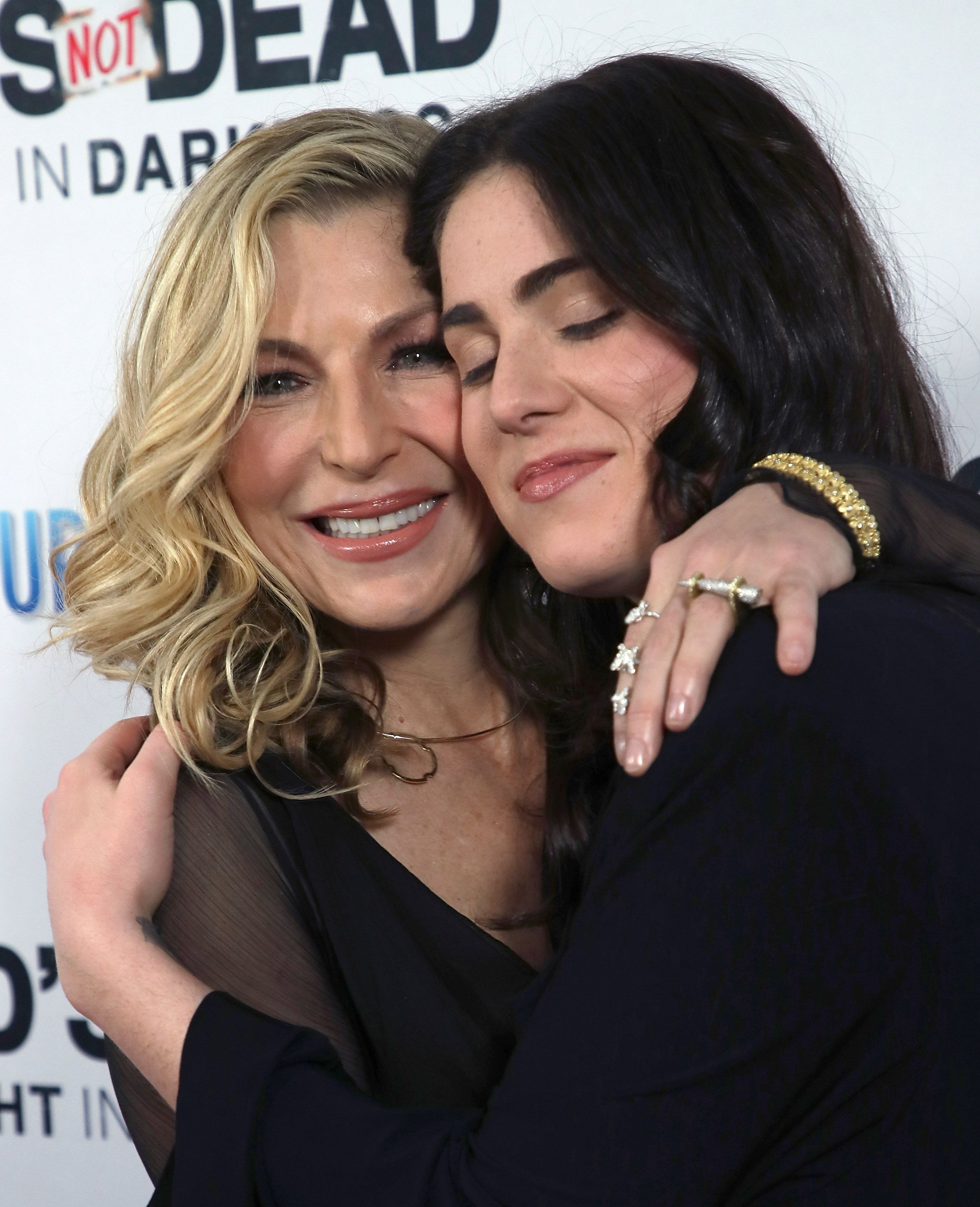 Tatum O'Neal and daughter Emily McEnroe at the premier of "God's Not Dead: A Light in Darkness" in 2018 in Hollywood, California. 