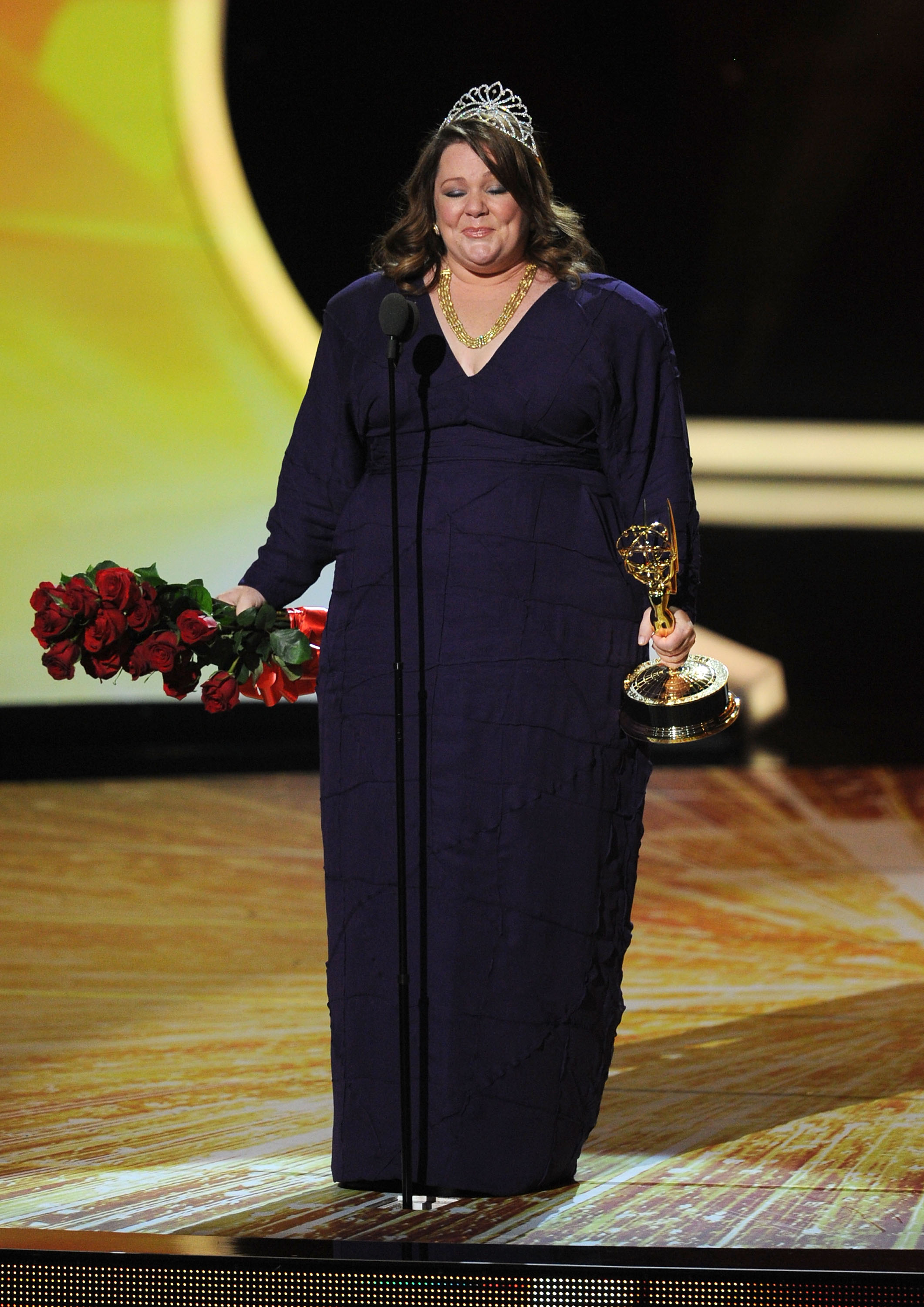 In 2011, McCarthy reached a major milestone, taking the Emmy stage in a classic gown, marking her breakout moment and a new level of red carpet presence.