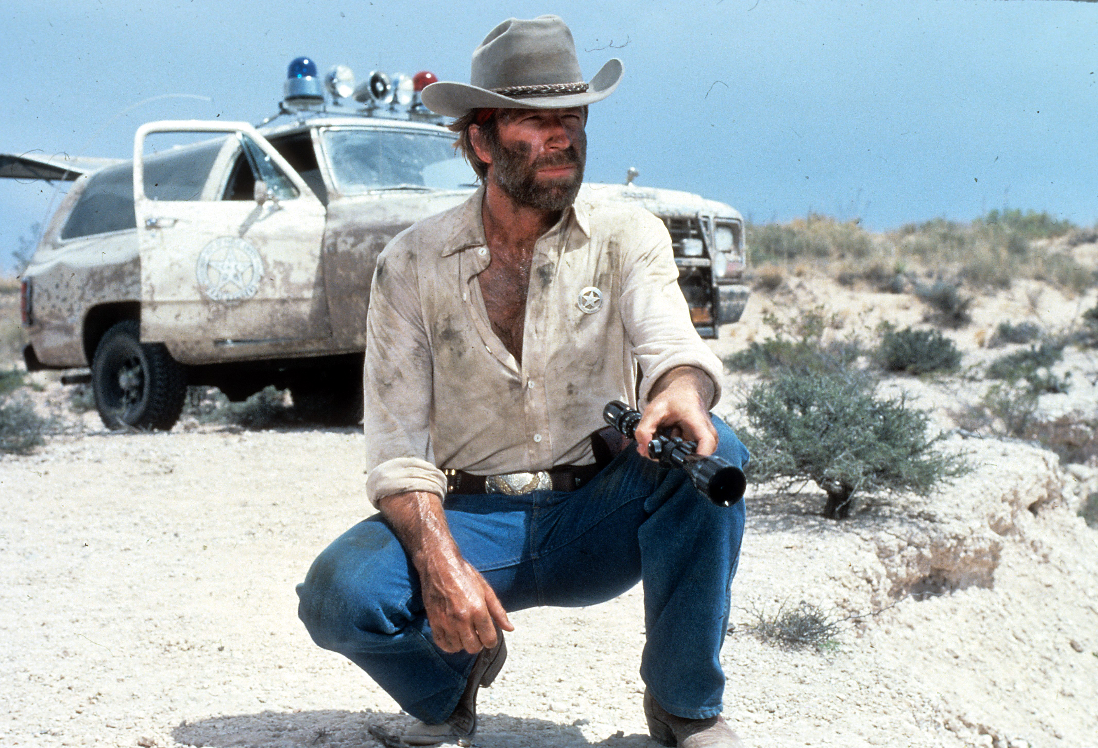 Chuck Norris a renegade Texas Ranger in a scene from the film 'Lone Wolf McQuade', 1983. | Source: Getty Images