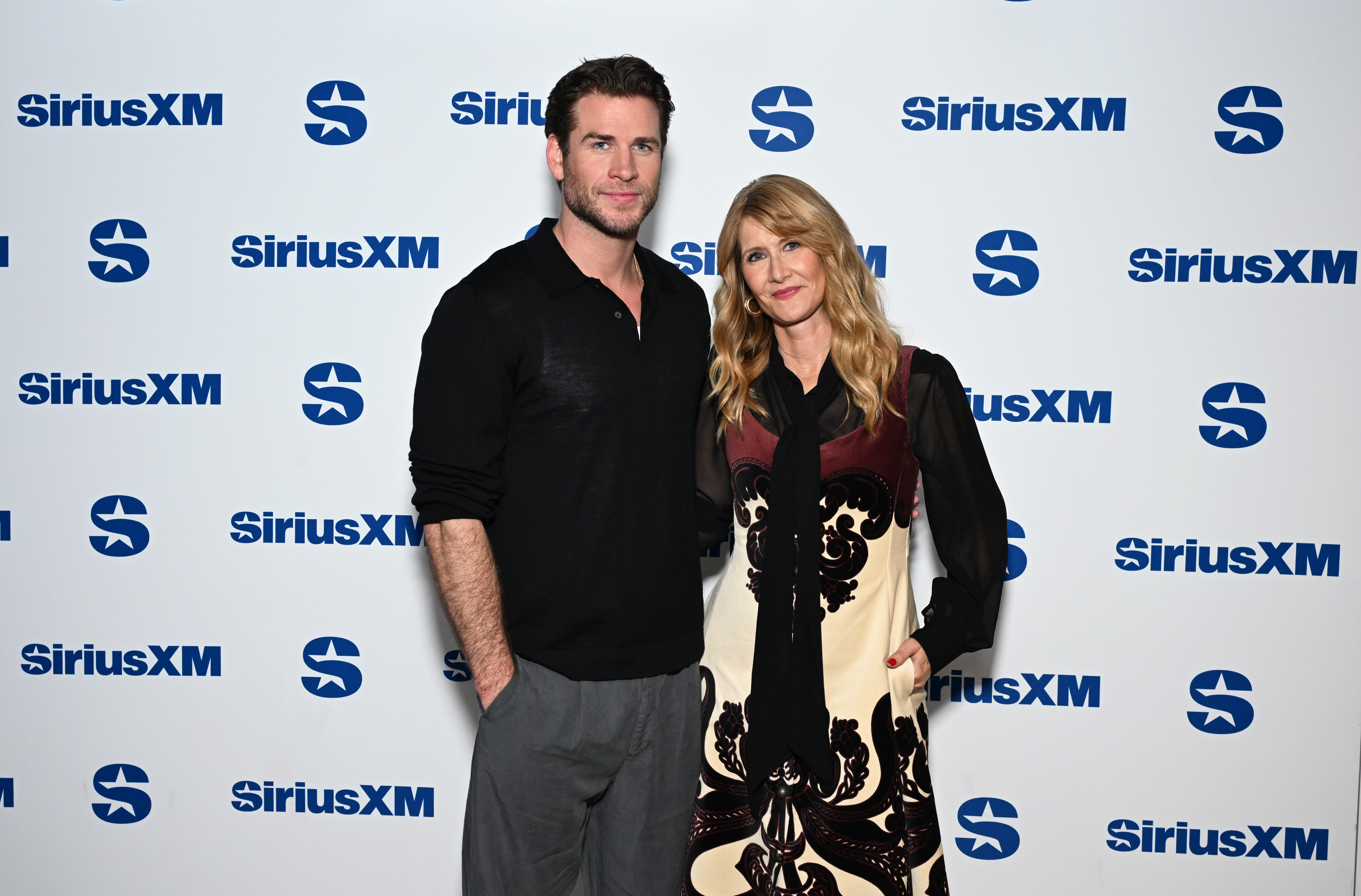 Liam Hemsworth and Laura Dern visit SiriusXM Studios on September 30, 2024, in New York City. | Source: Getty Images