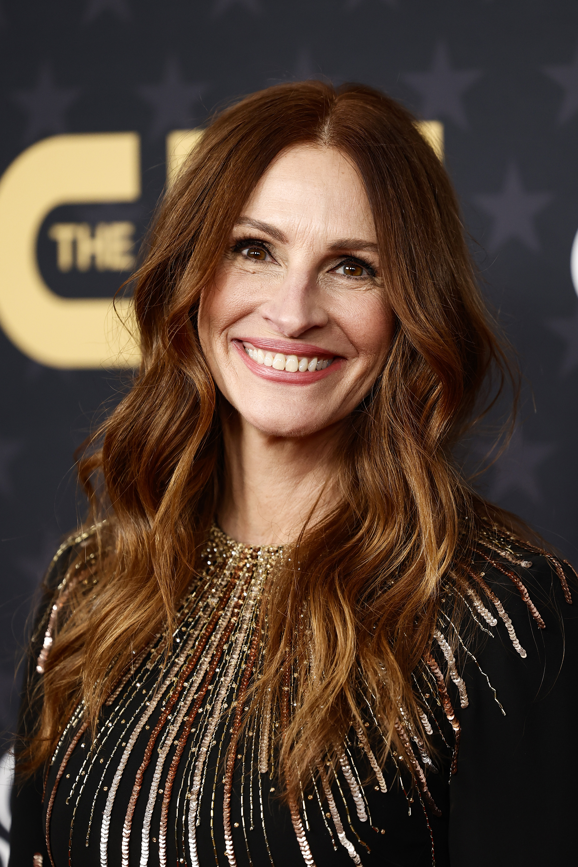 Julia Roberts attended the 28th Annual Critics Choice Awards on January 15, 2023, in Los Angeles, California. Her signature auburn waves framed a radiant, familiar smile, while her expressive brown eyes and warm, freckled complexion delivered the kind of effortless charm that has defined her for decades. | Source: Getty Images