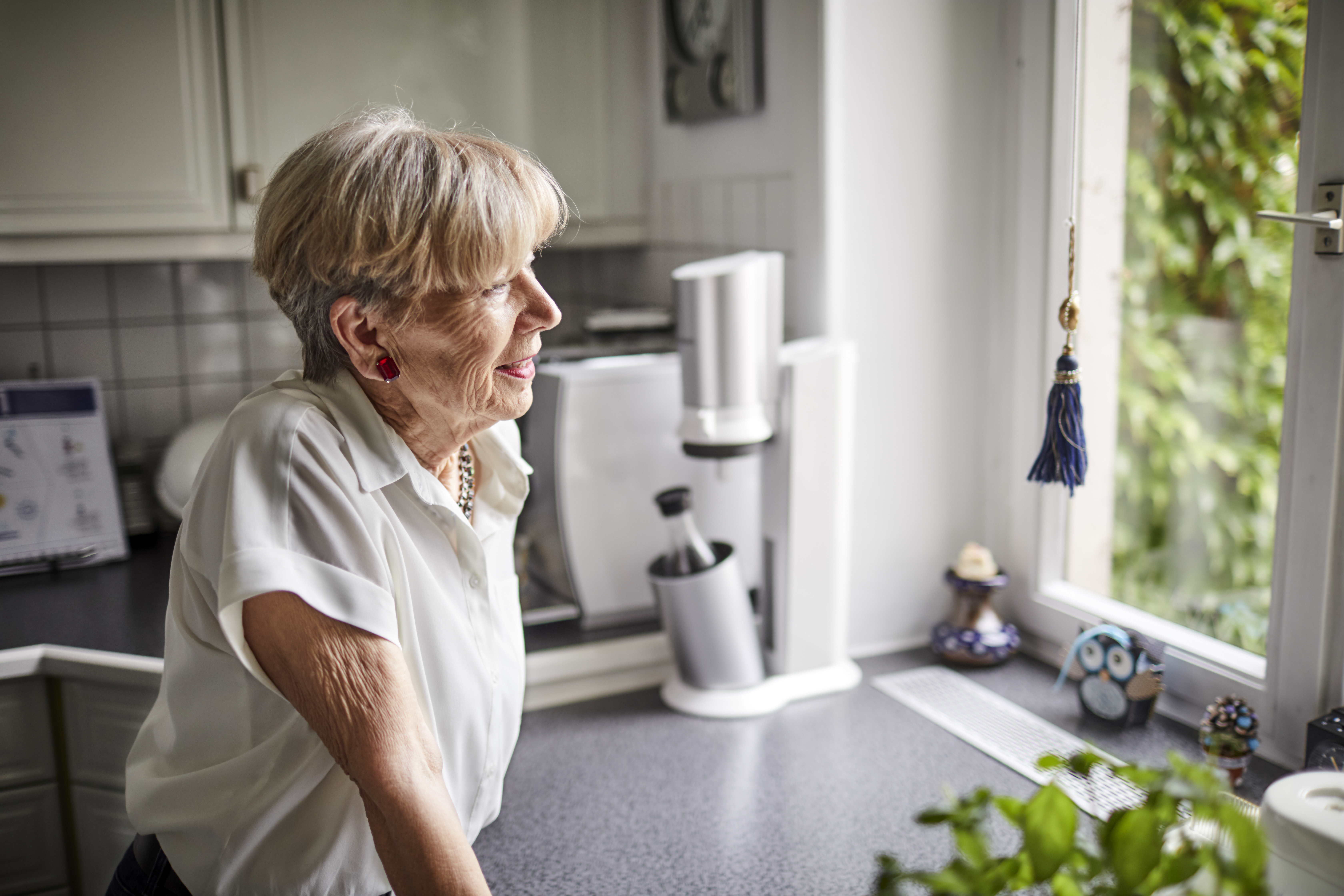 Retired woman in her apartment | Source: Getty Images