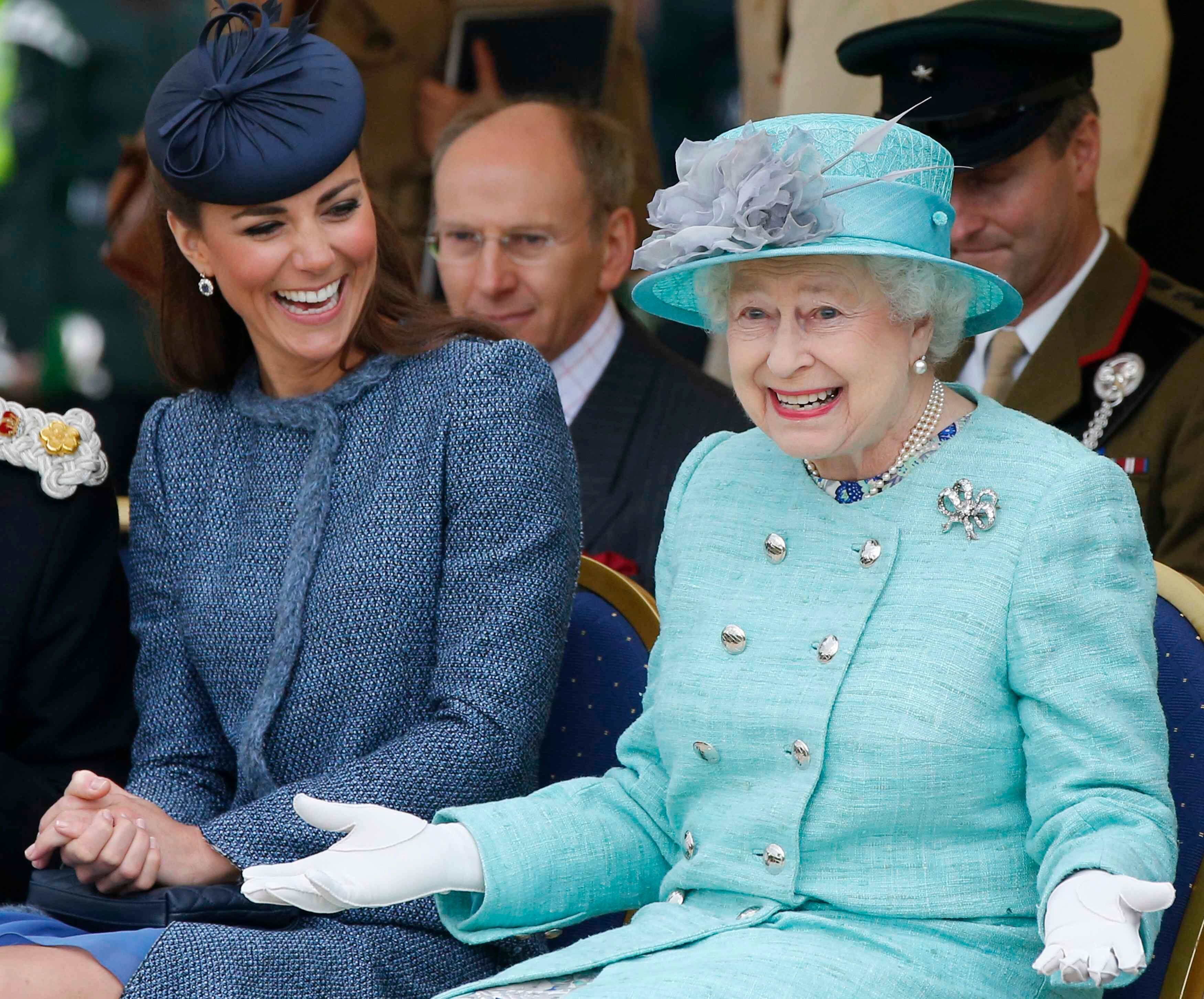 Kate Middleton and Queen Elizabeth II watch a children's sports event at Vernon Park | Getty Images