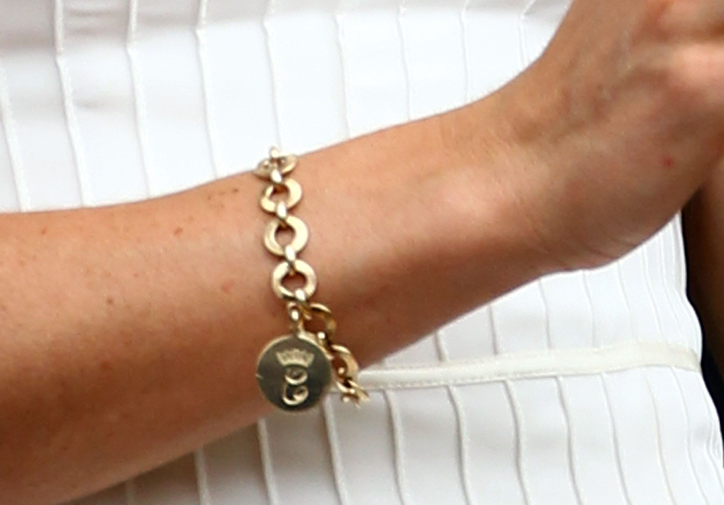 A close-up of the bracelet the Princess of Wales wore on day seven of the Wimbledon Championships at the All England Lawn Tennis and Croquet Club on June 27, 2011, in London. | Source: Getty Images