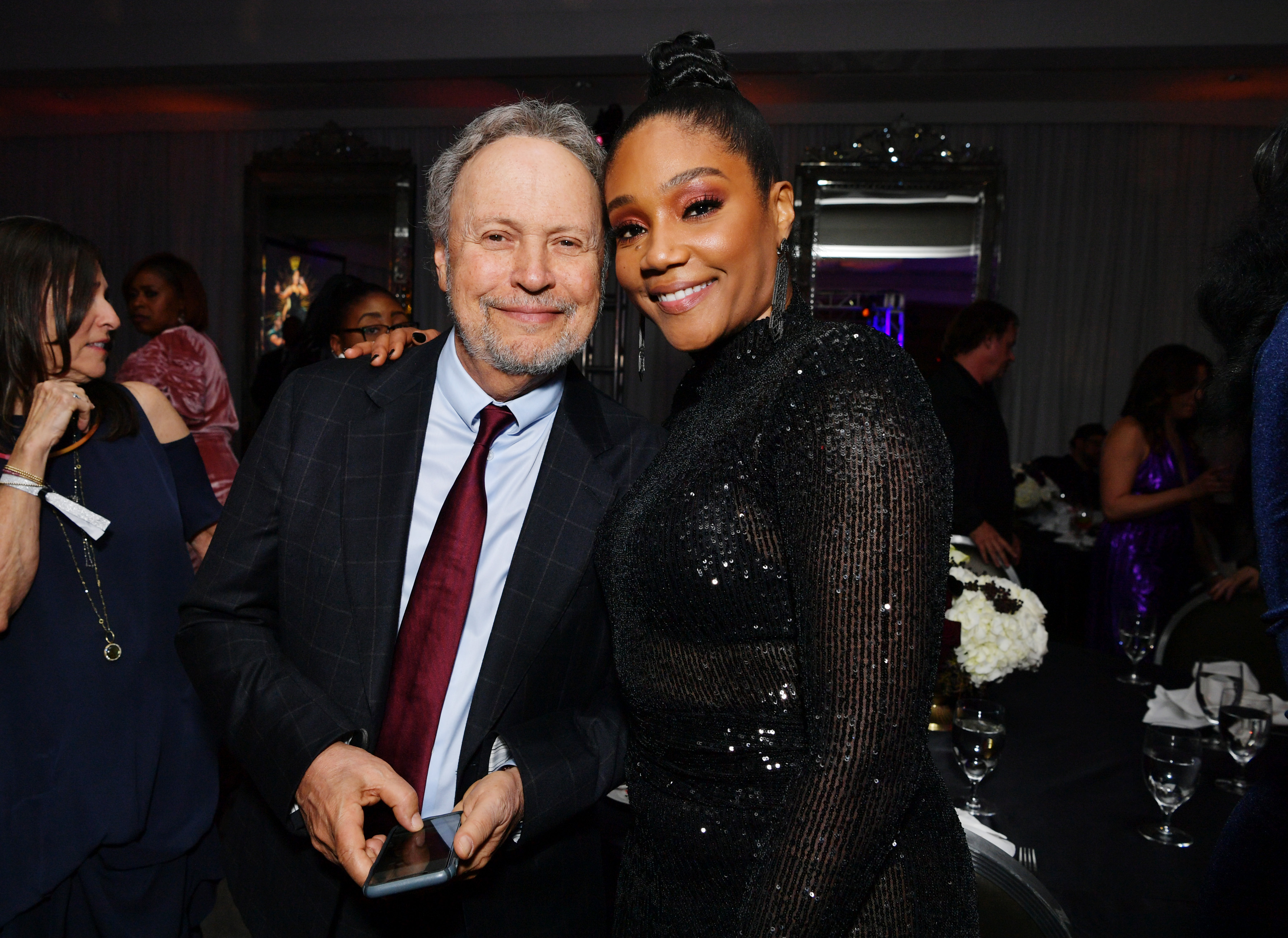 Billy Crystal and Tiffany Haddish at "Tiffany Haddish: Black Mitzvah" at SLS Hotel on December 3, 2019, in Beverly Hills, California | Source: Getty Images