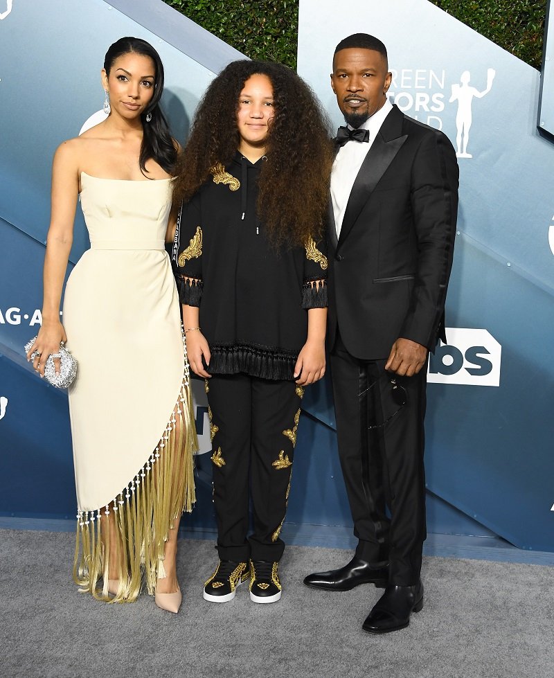 Jamie Foxx with his daughters, Corinne Foxx and Annalise Bishop at the 26th Annual Screen Actors Guild Awards in January 2020. | Photo: Getty Images