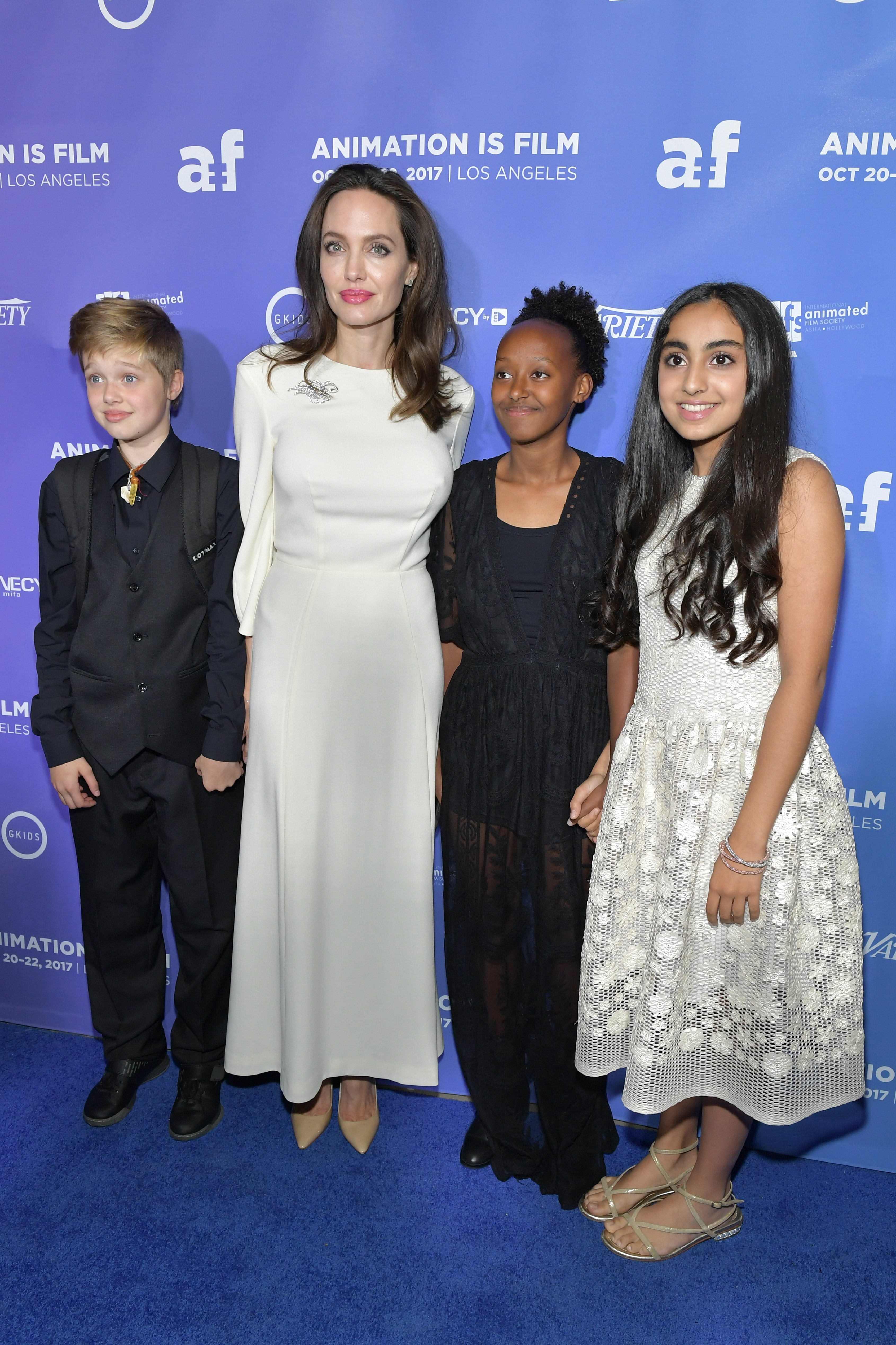 Shiloh Jolie-Pitt, Angelina Jolie, Zahara Jolie-Pitt and Saara Chaudry attend the premiere of Gkids' 'The Breadwinner' at TCL Chinese 6 Theatres on October 20, 2017 in Hollywood, California.| Source: Getty Images