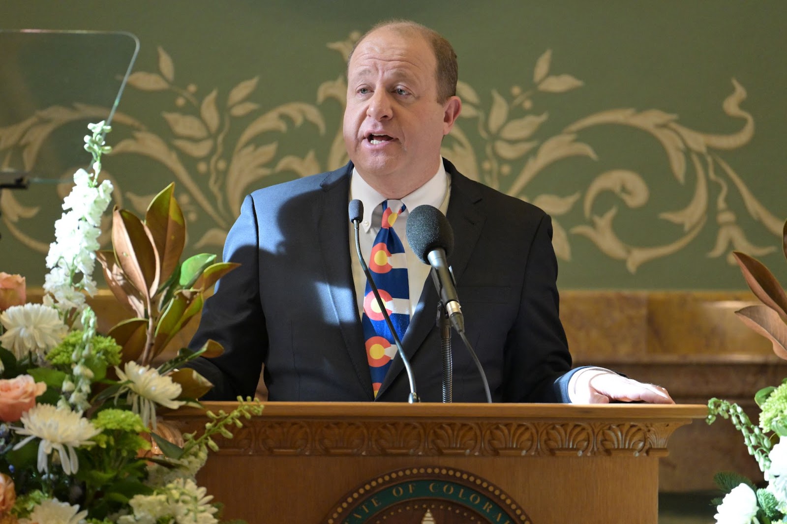 Governor Jared Polis delivering his state of address at the Colorado State Capitol building in Denver, Colorado, on January 9, 2025 | Source: Getty Images