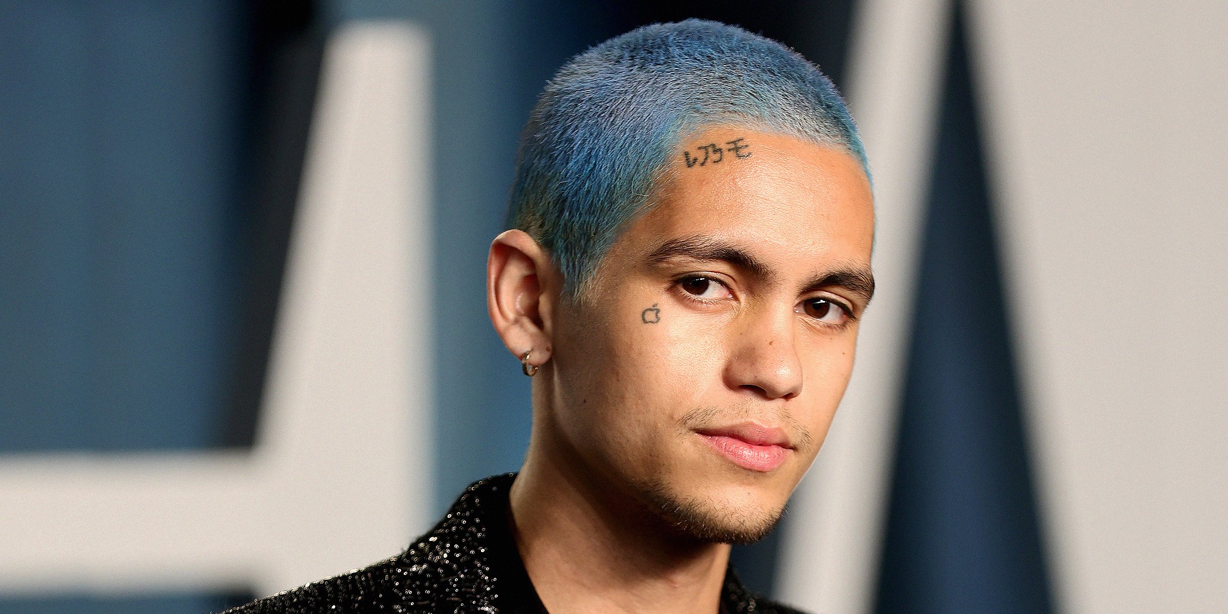 The Meaning of Dominic Fike’s Apple Tattoo on His Face