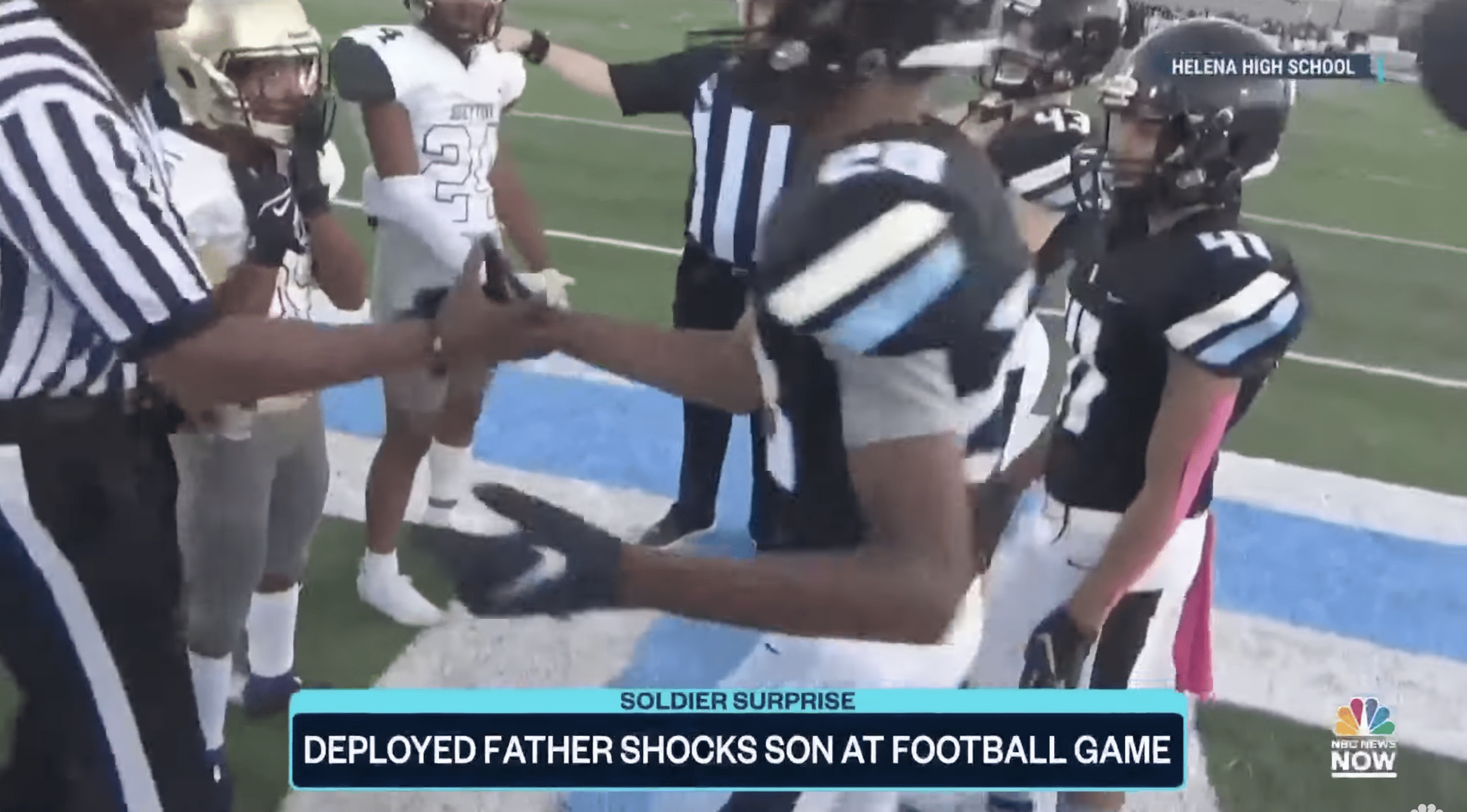 Grooms III shaking hands with his father who was disguises as a referee. | Photo: YouTube.com/NBC News