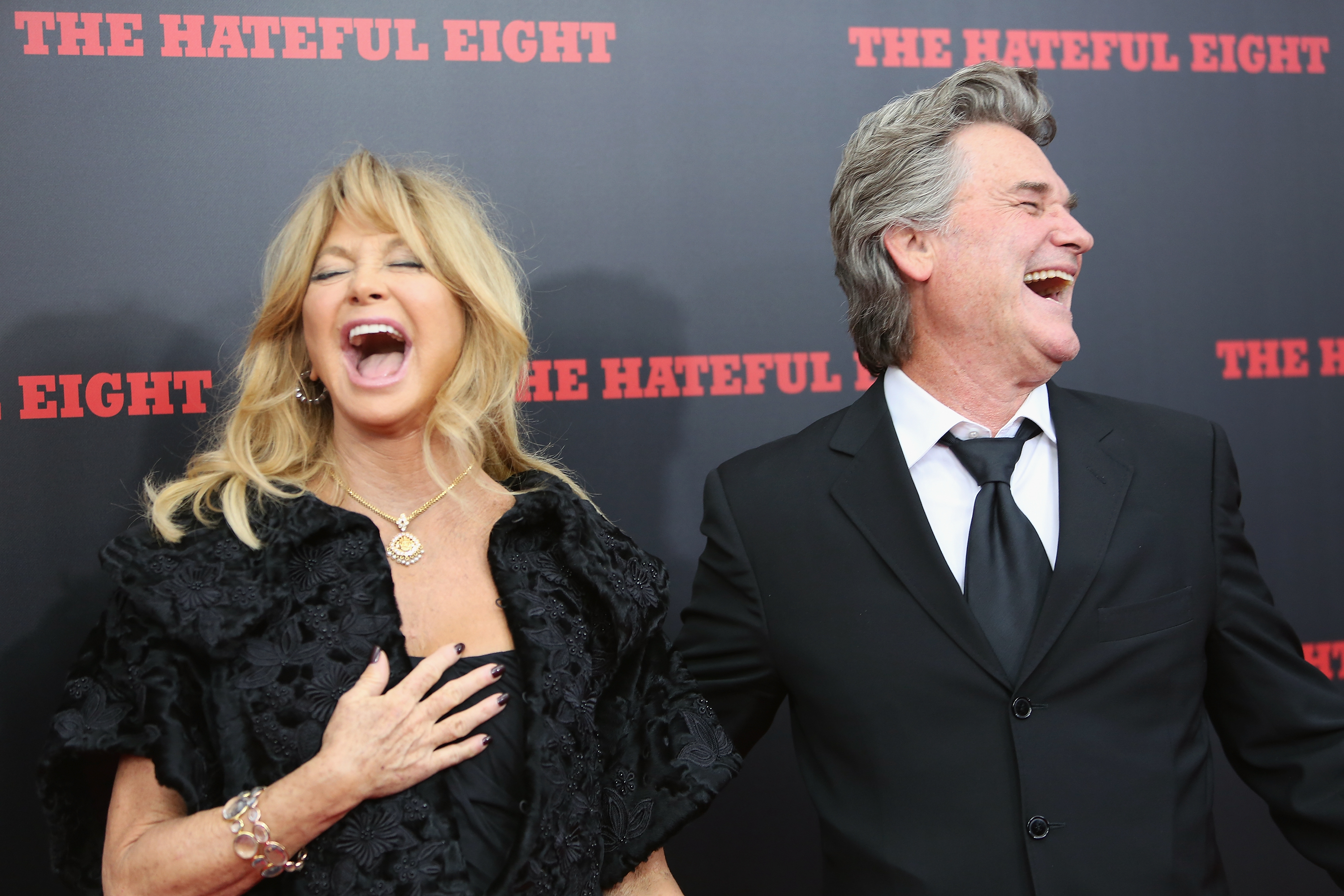Goldie Hawn and Kurt Russell laugh together as they attend the premiere of "The Hateful Eight" in New York City on December 14, 2015. | Source: Getty Images