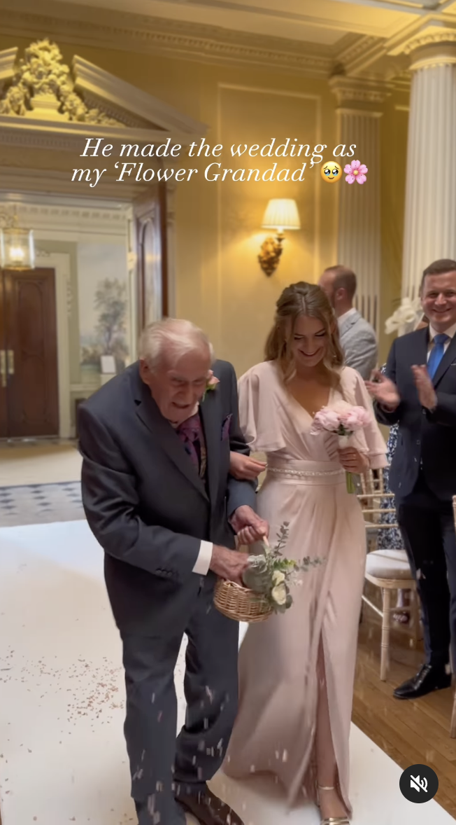 Grandfather Bert Edlin is seen playing the role of a flower boy as he walks his granddaughter Rachel Powell down the aisle. | Source: instagram.com/rachelpitman13