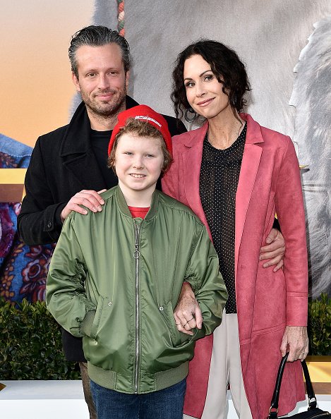 Minnie Driver, Addison O'Dea and Henry Story Driver at Regency Village Theatre on January 11, 2020 in Westwood, California. | Photo: Getty Images