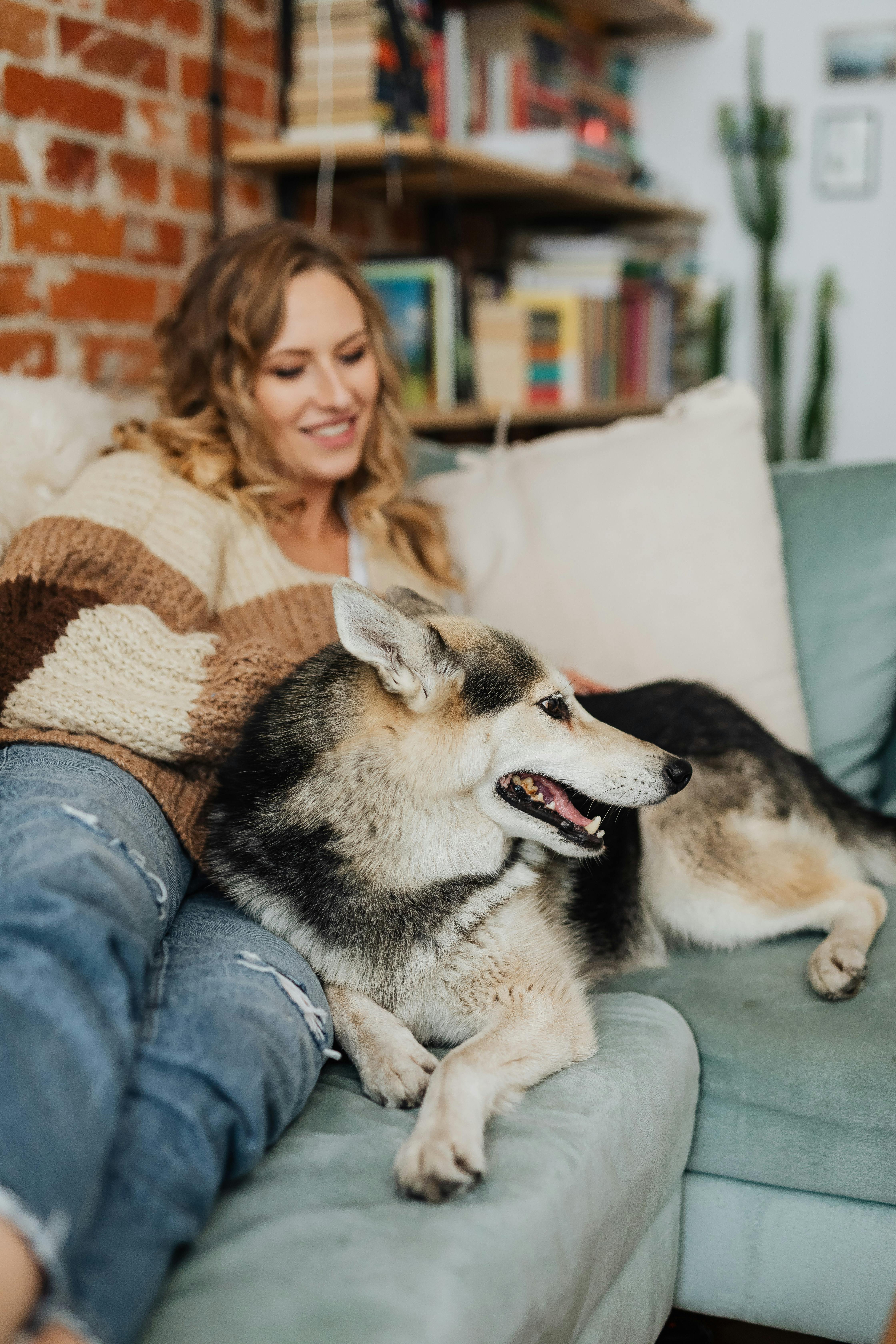 A happy woman with her dog | Source: Pexels