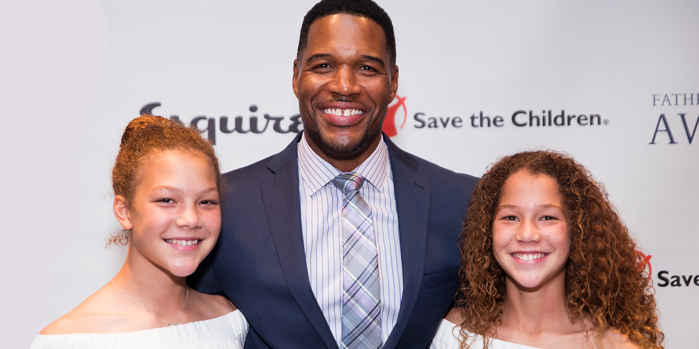 Michael Strahan with his twin daughters Sophia and Isabella Strahan. | Sources: Getty Images | YouTube/GMA