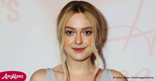 Dakota Fanning flashes her slender figure in black midi with cherry pattern during a recent outing
