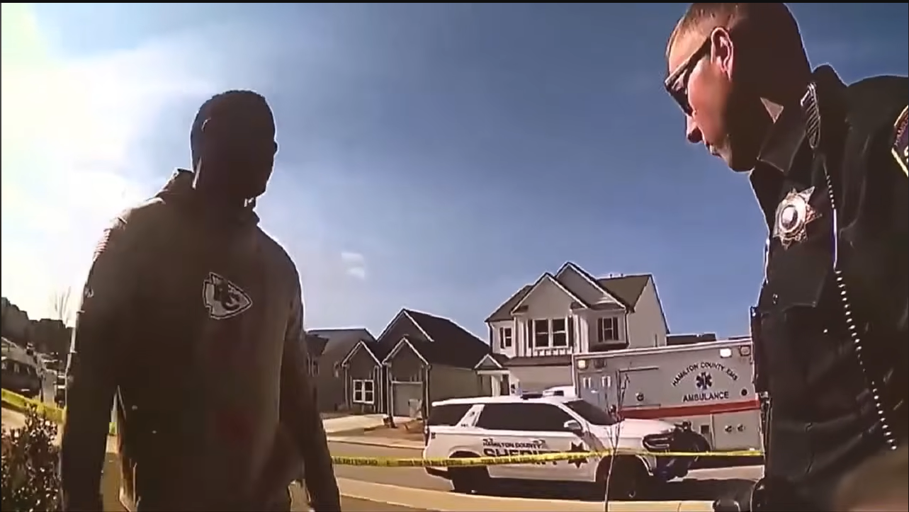 Darron Lee talks to police outside his home, posted on March 10, 2026 | Source: YouTube/@newschannelnine