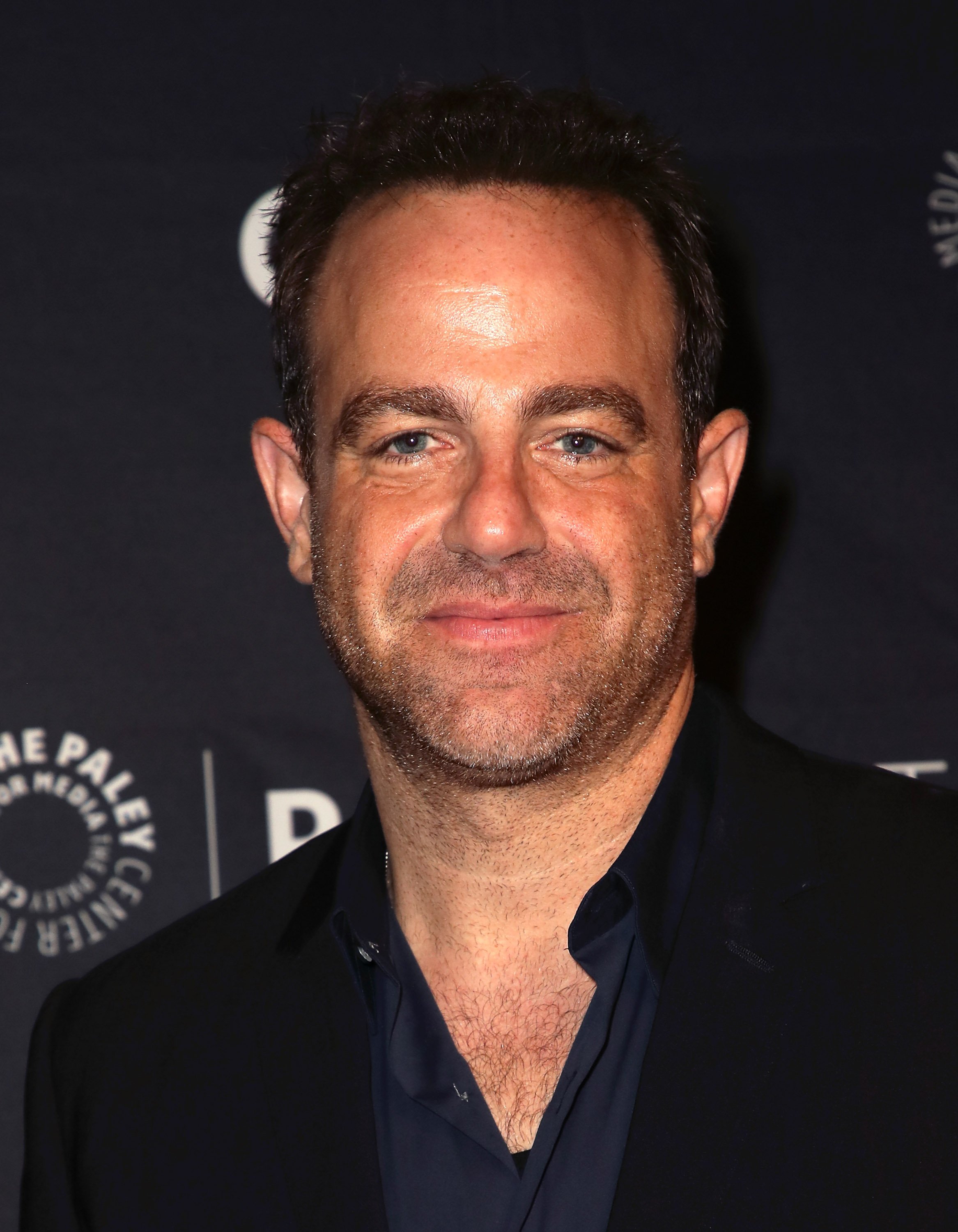 Paul Adelstein from "I Feel Bad" attends The Paley Center for Media's 2018 PaleyFest Fall TV Previews - NBC at The Paley Center for Media on September 10, 2018, in Beverly Hills, California. | Source: Getty Images.