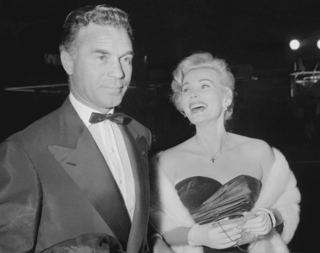 Socialite Zsa Zsa Gabor dressed up in an evening dress with lover Porfirio Rubirosa, in 1955 | Photo: Getty Images